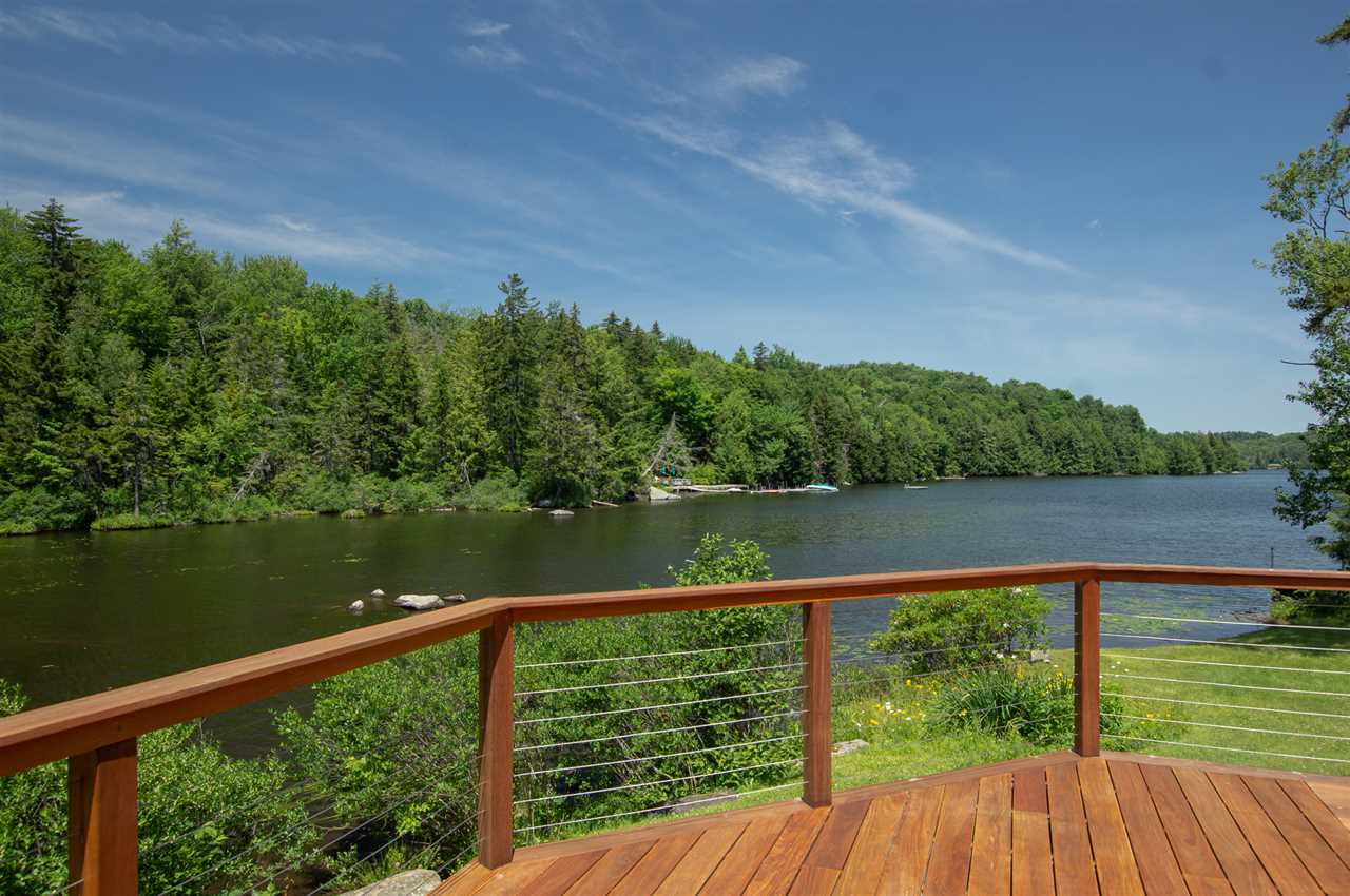 Enjoy the peaceful lake from this bright home...