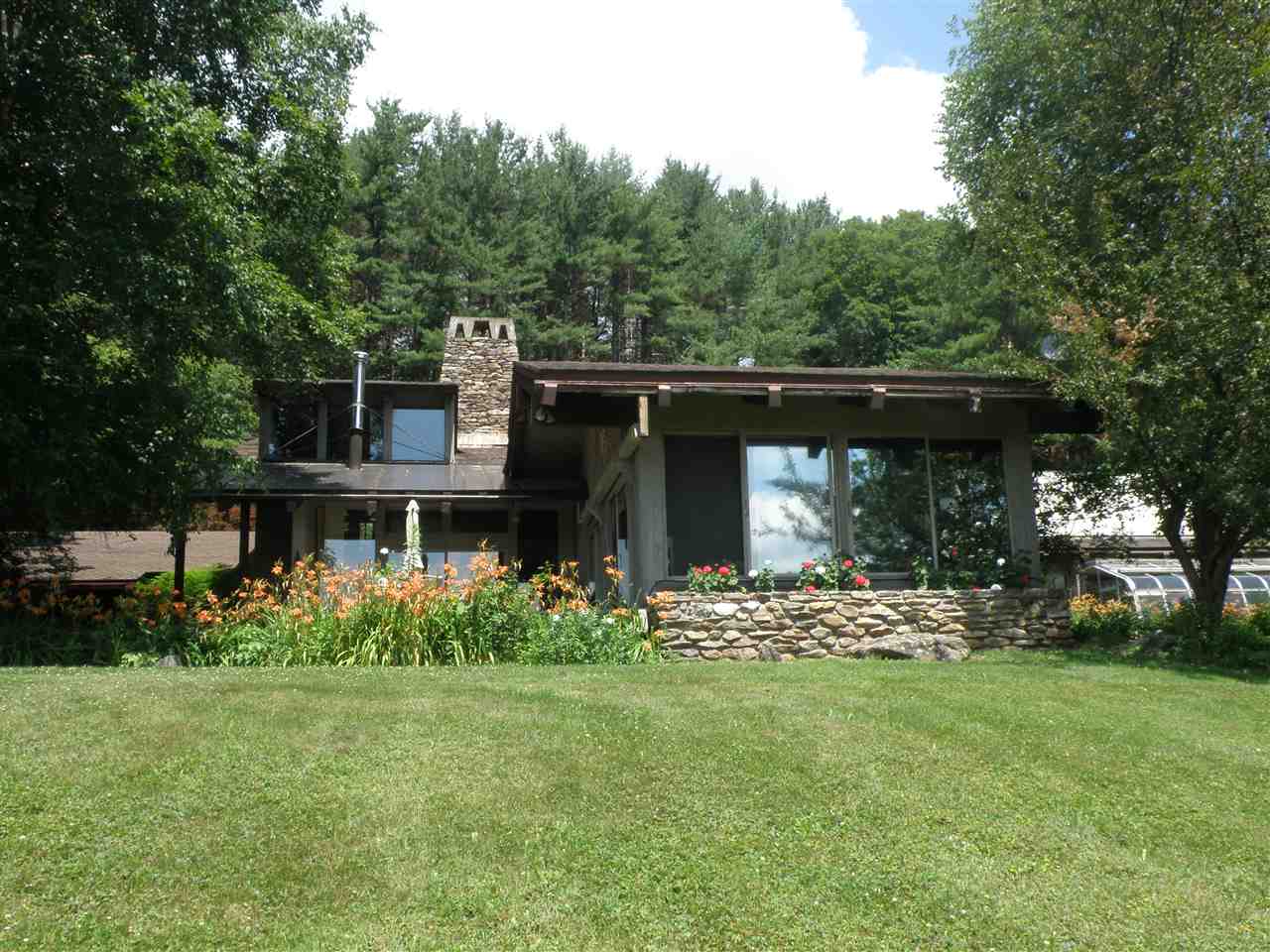 The Fawn Ledge Lane property includes a 3...