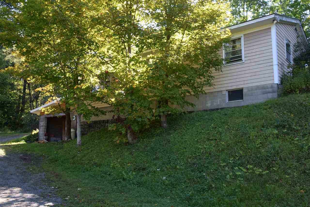 High on the hill sits this family style home with...