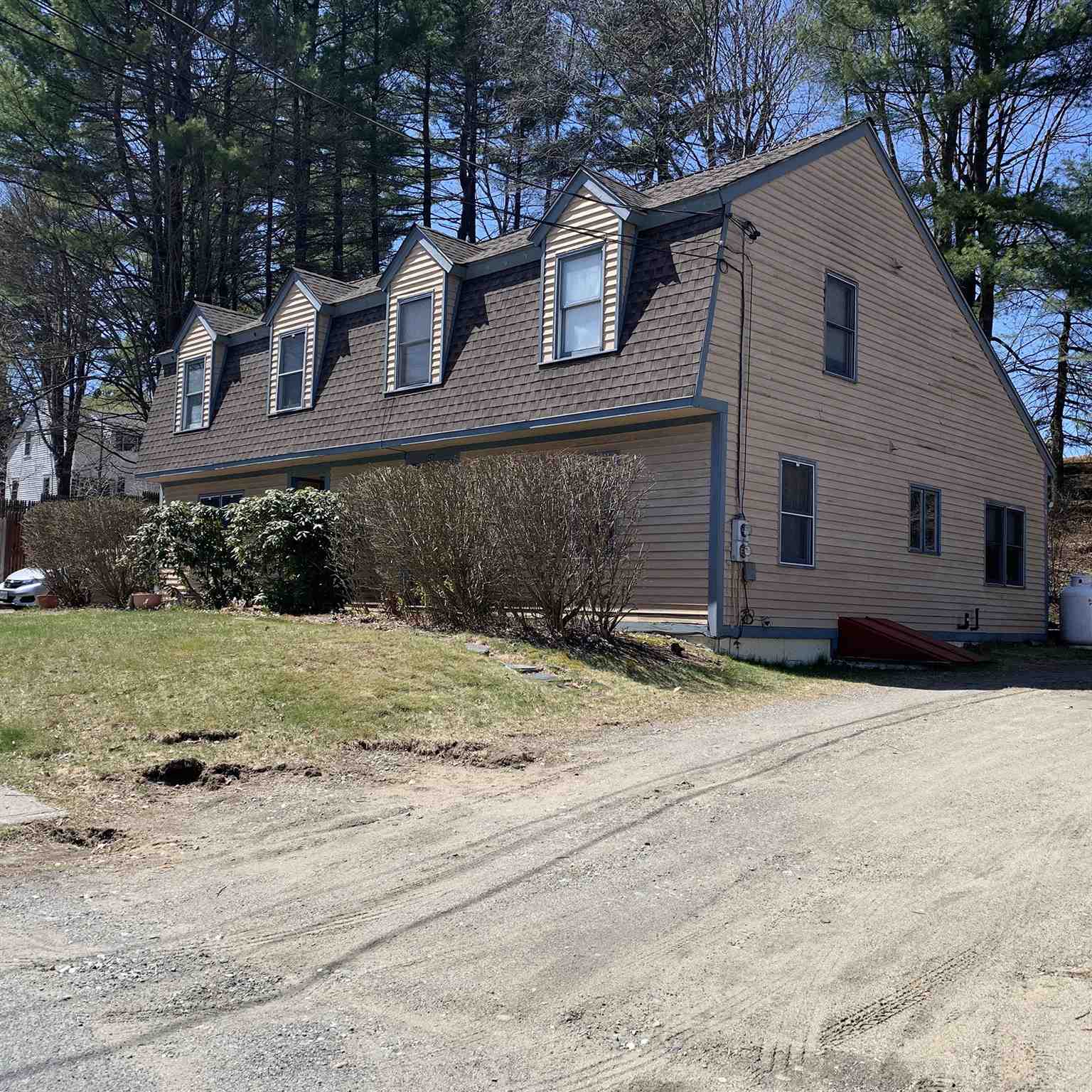 This wonderful duplex sits on a spacious corner...
