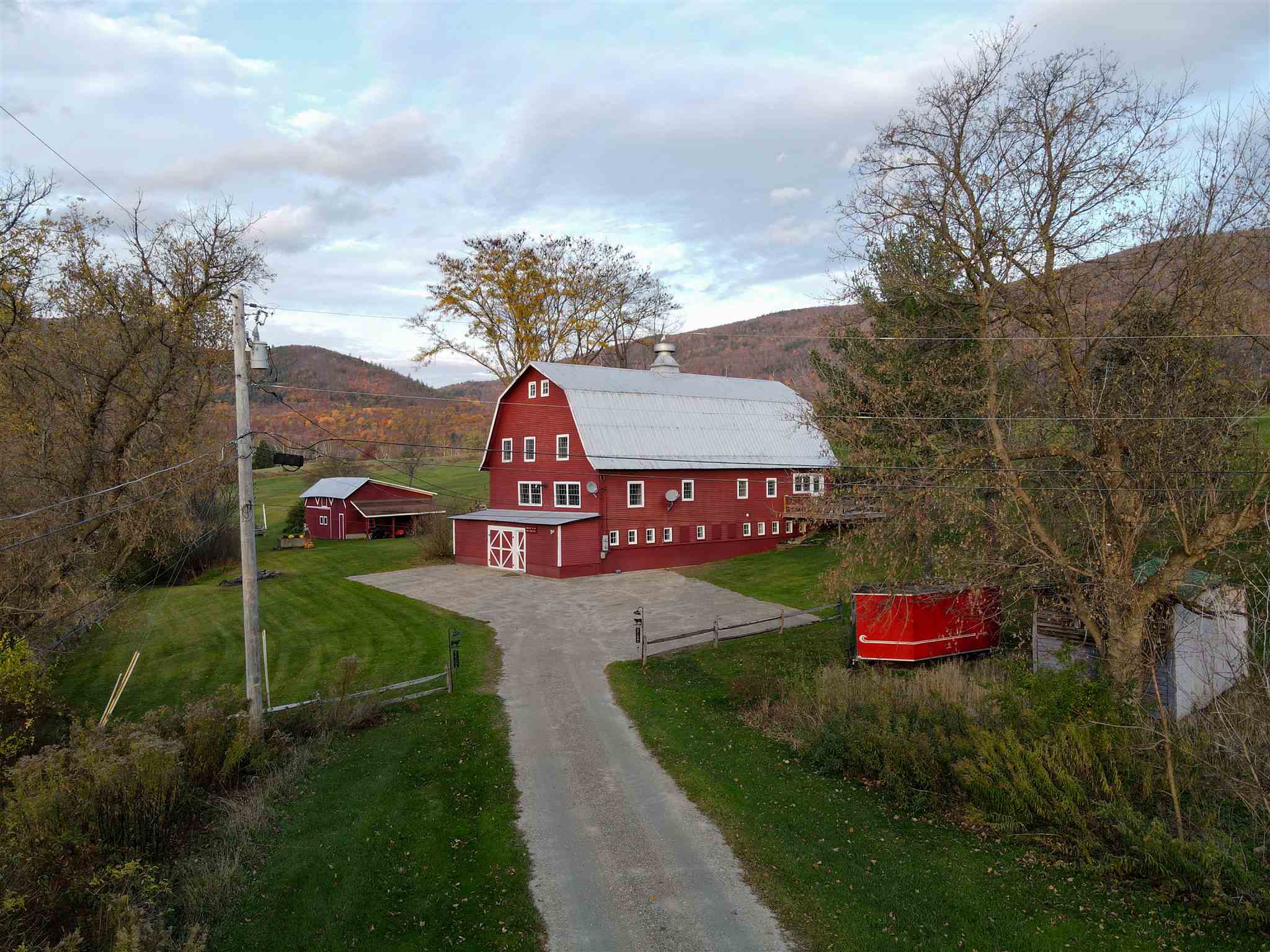 Outstanding renovated barn with outbuildings. ...