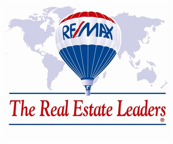 RE/MAX Village Properties Corp. Logo