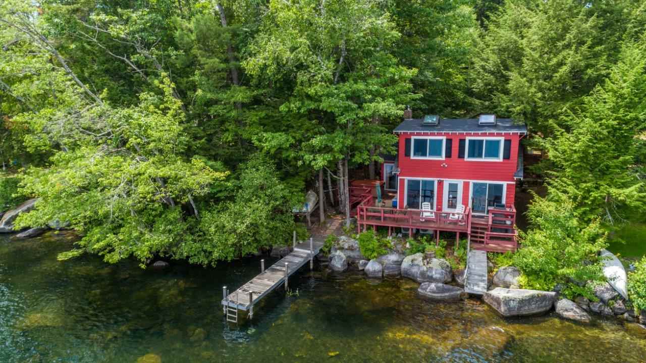 Lake Waukewan waterfront home for sale in New Hampton