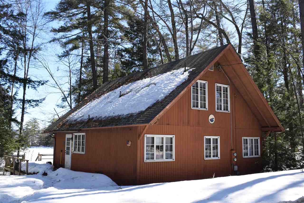 Lake Lake Waukewan waterfront home for sale in New Hampton