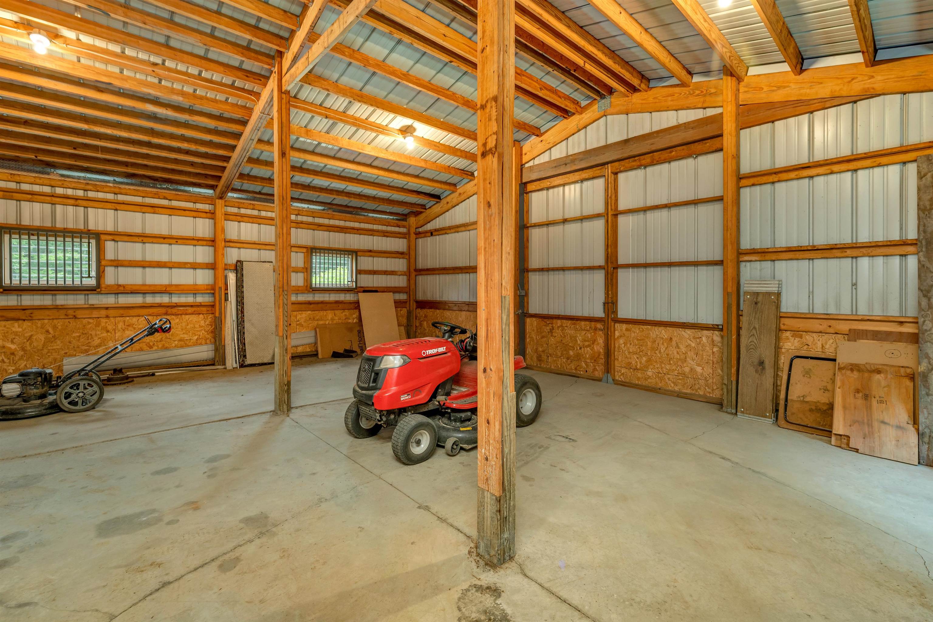 Can store cars or trucks in here.  Large slider door to pasture area.