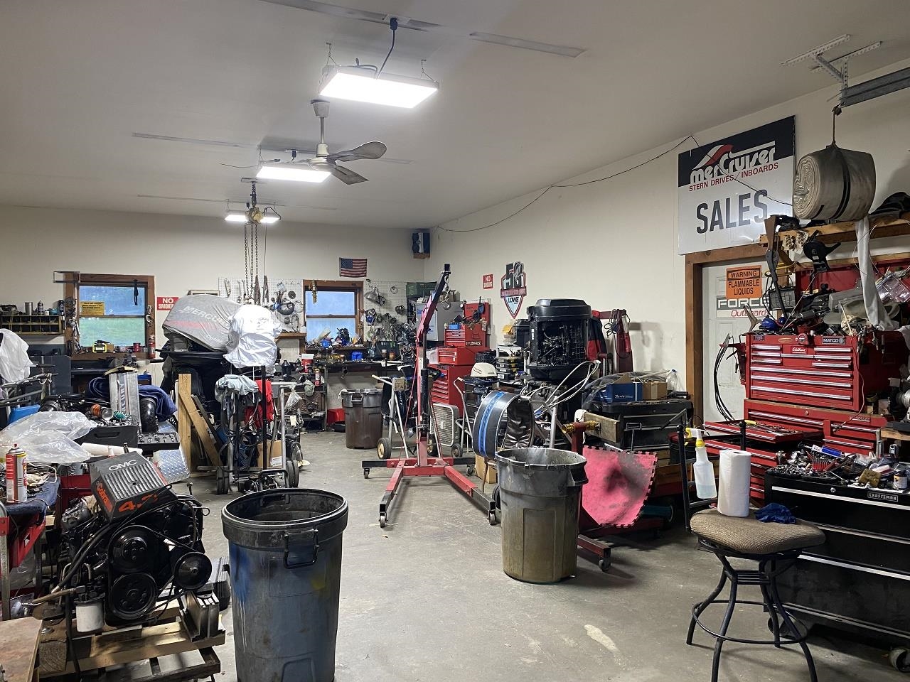 Garage With Great Lights and Fans For Circulation