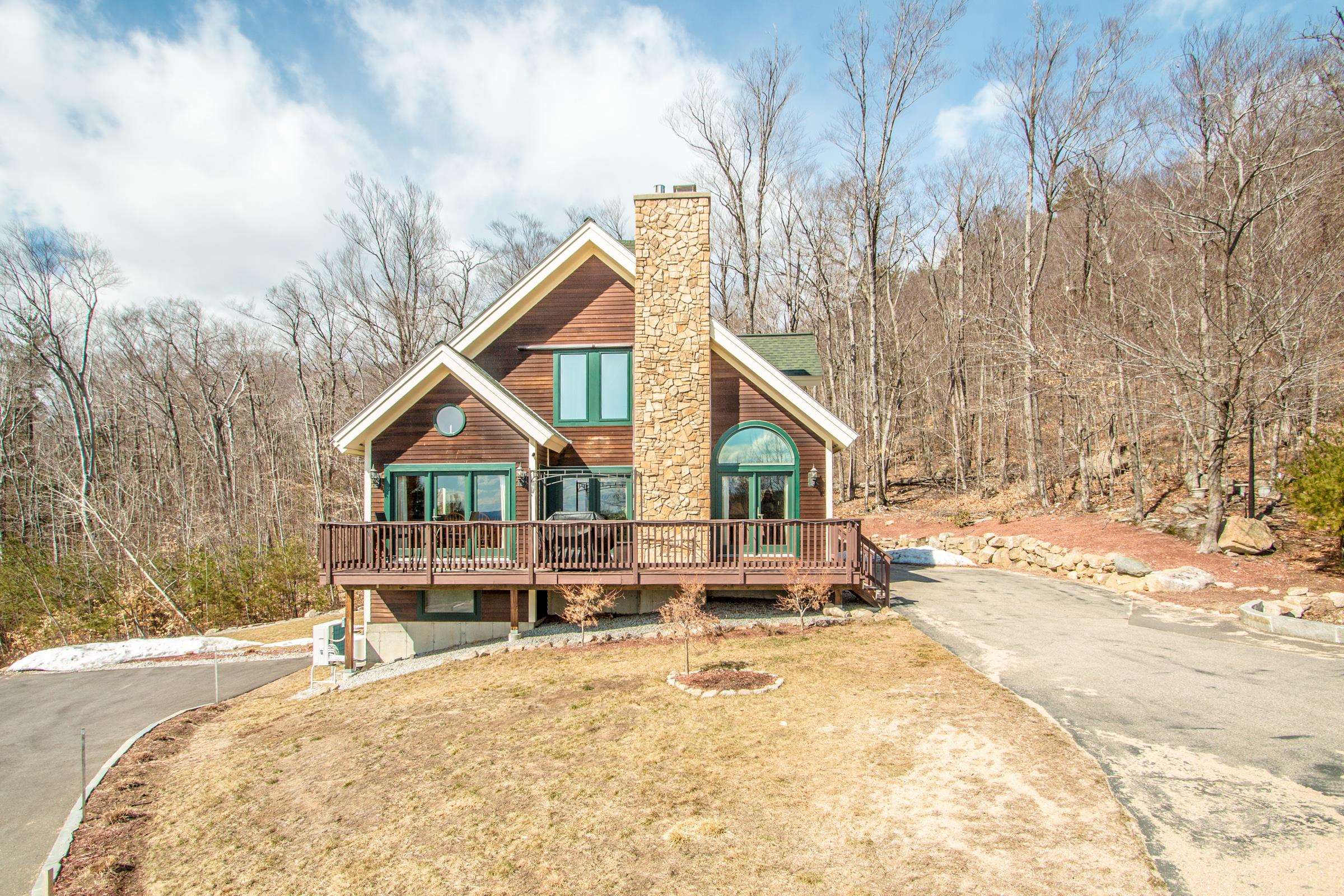 Stunning open concept Contemporary Chalet with beautiful mountain views. Located so close to everything the Mt. Washington Valley has to offer. Perfectly set on a knoll in a private neighborhood just outside of town and abuts 1200 acres of conservation land! Bright cheery floor plan that flows from room to room. The home has a large living room with cathedral ceilings, a first floor bedroom and bath with two bedrooms and bath in the upper level. The basement has been finished with nothing but taste and fun in mind. The lower level family room has great space for entertaining your guests with a wet bar & plenty of room for family game and movie night. Relax out on the deck while you soak in the suns rays or watch the shooting stars fill the nights sky. This truly is the perfect home. Open house Saturday 3/26 from 11am -1pm & Sunday 3/27 2pm - 4pm.