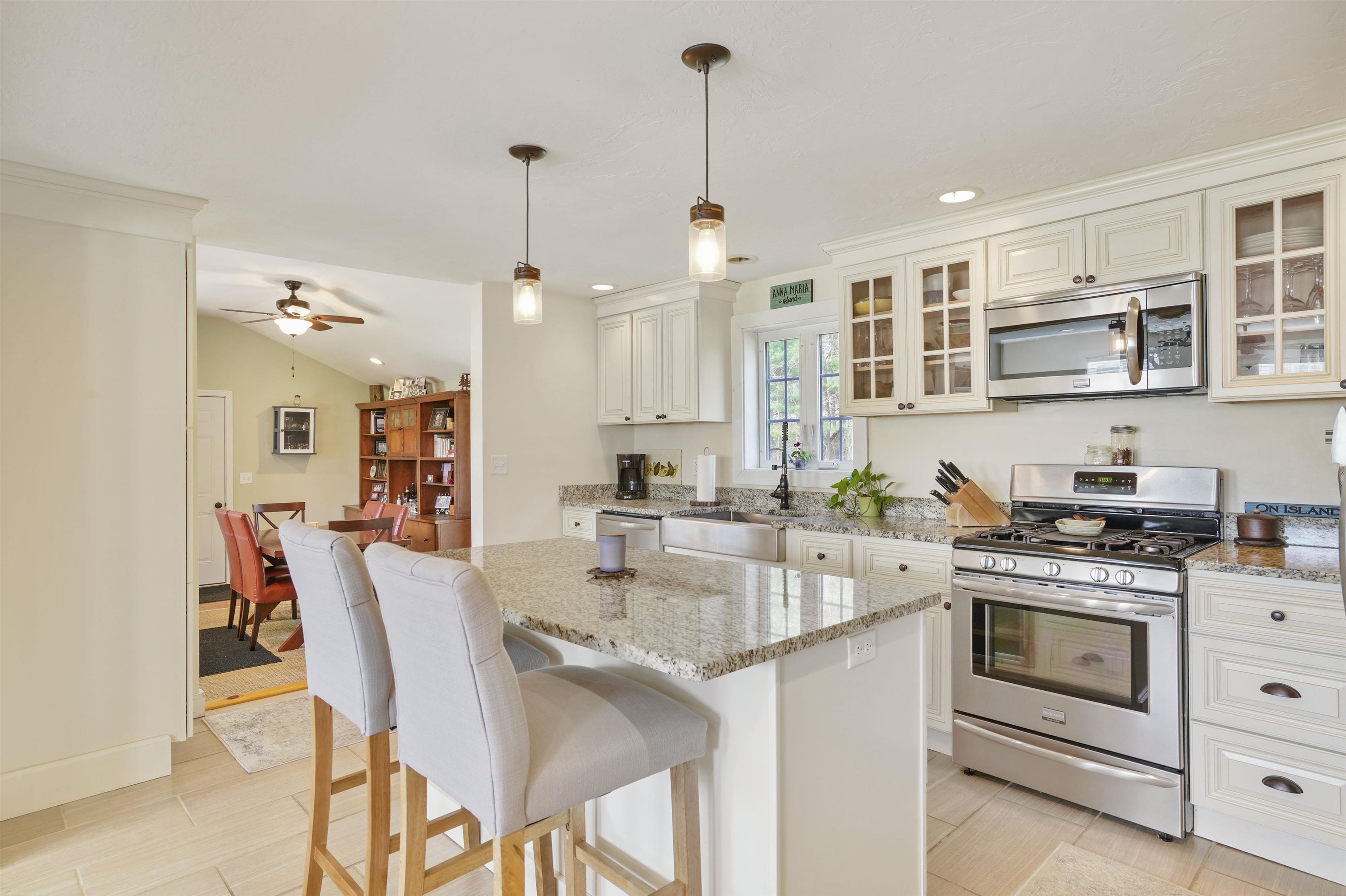 There is no shortage of cabinet space in this lovely kitchen!