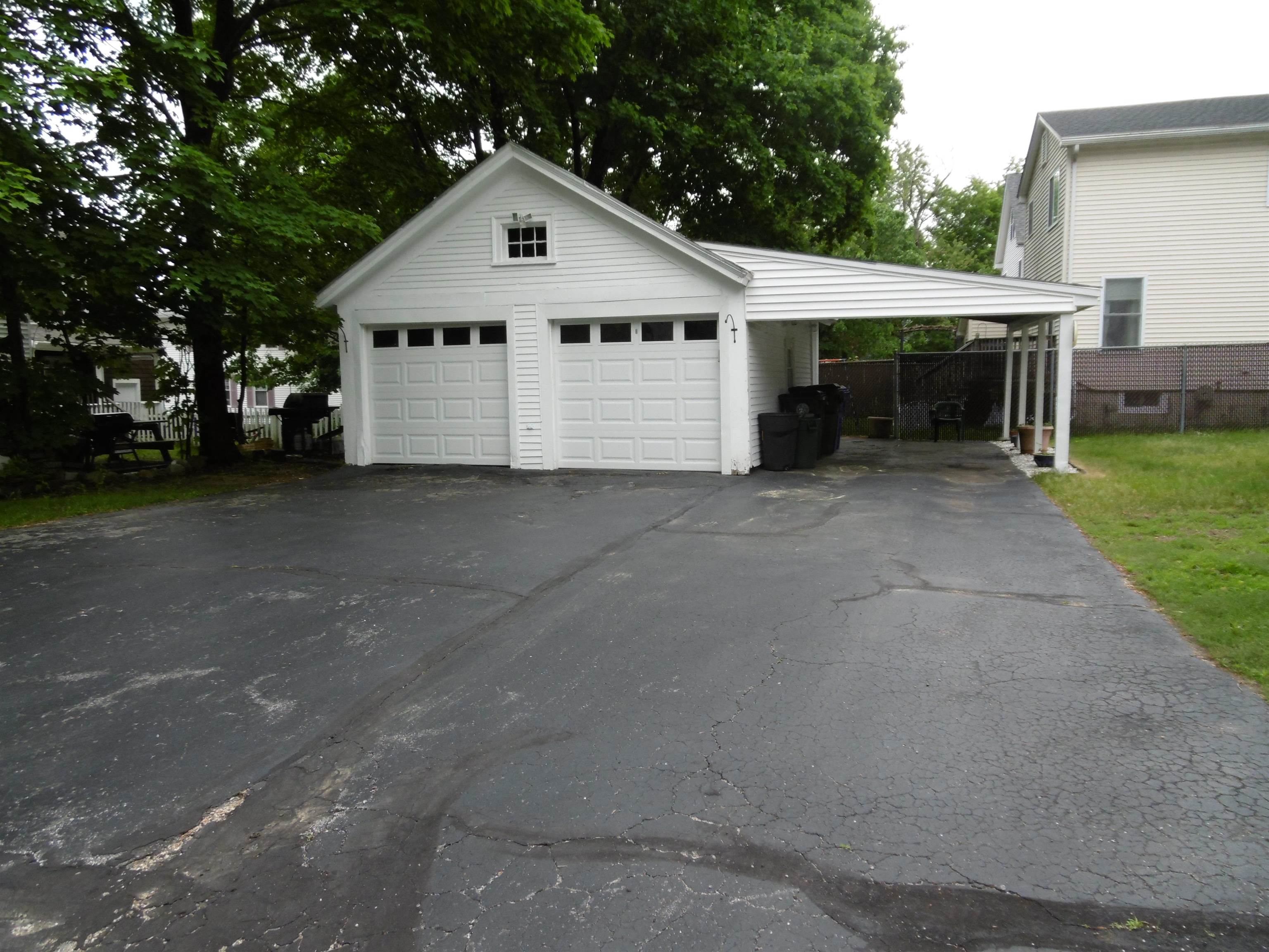 TWO CAR GARAGE + CARPORT. LOTS OF PARKING FOR EVERYONE