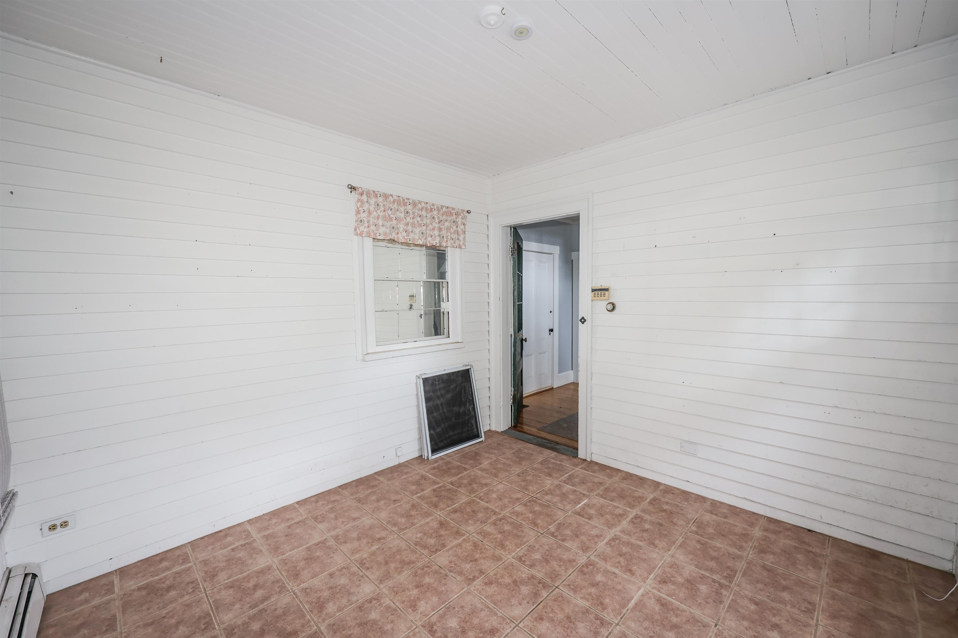 Unit A - 3 season porch / mudroom located on the 1st floor