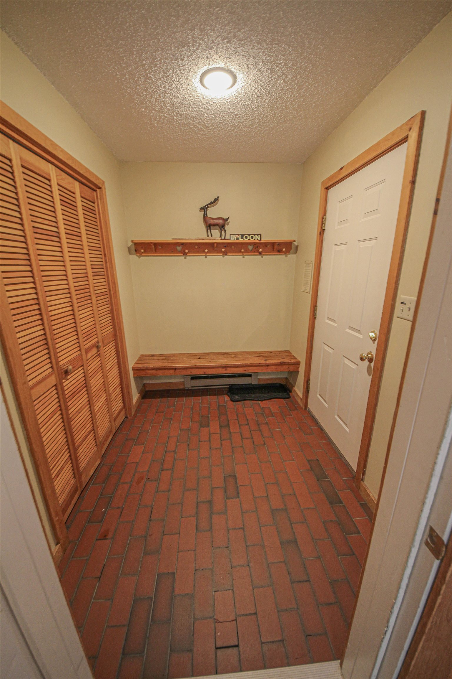 Spacious entry with coat closet