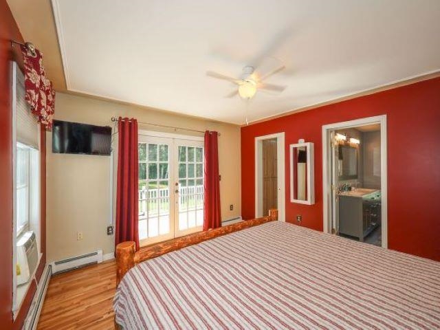 1st floor Primary bedroom, steps out to your back yard/ Pool area