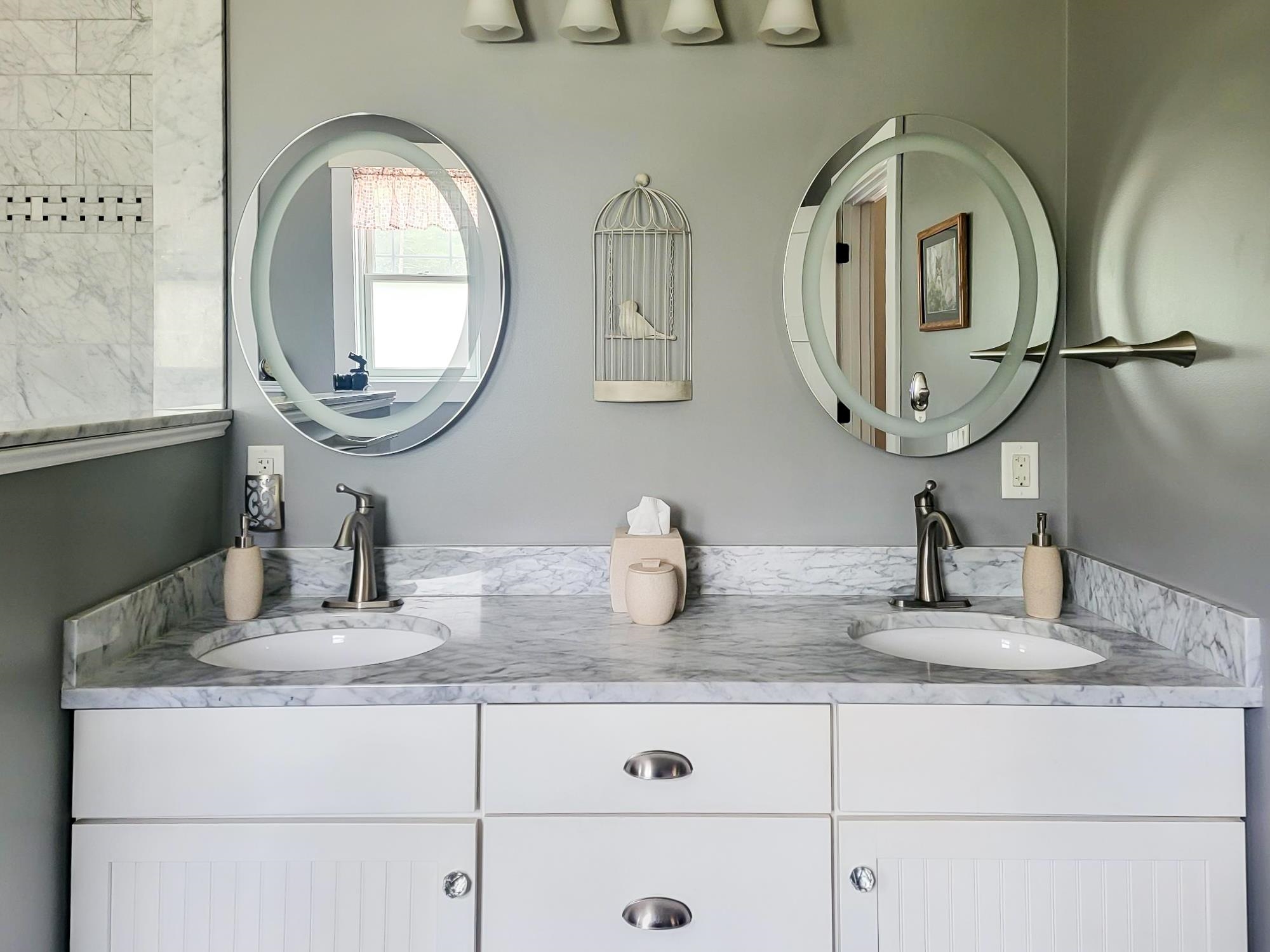 Lighted mirrors above double vanity