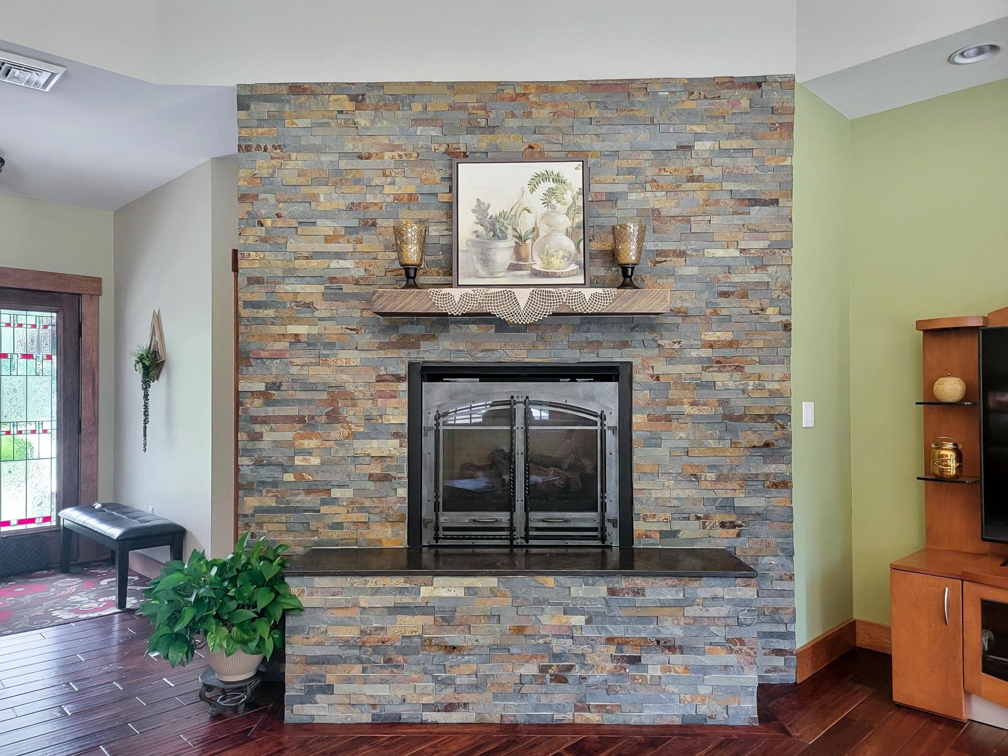 Natural stone gas fireplace and hearth