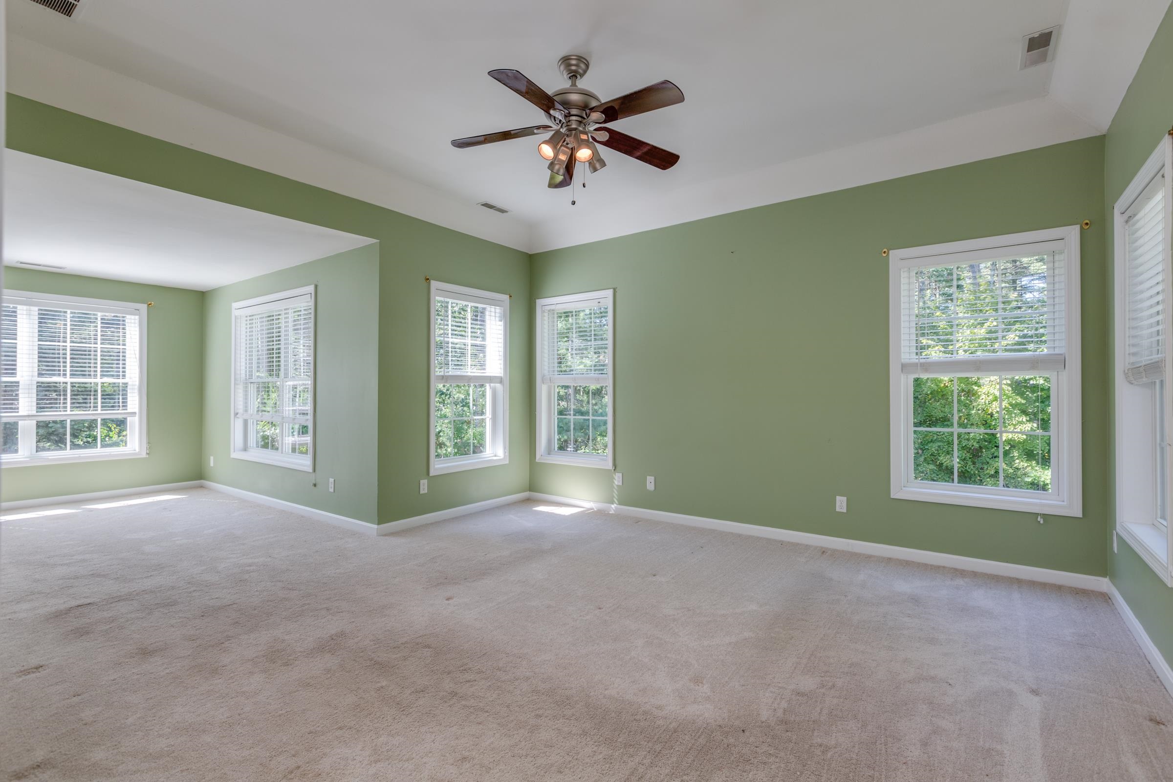 Large Primary Bedroom with tray ceiling