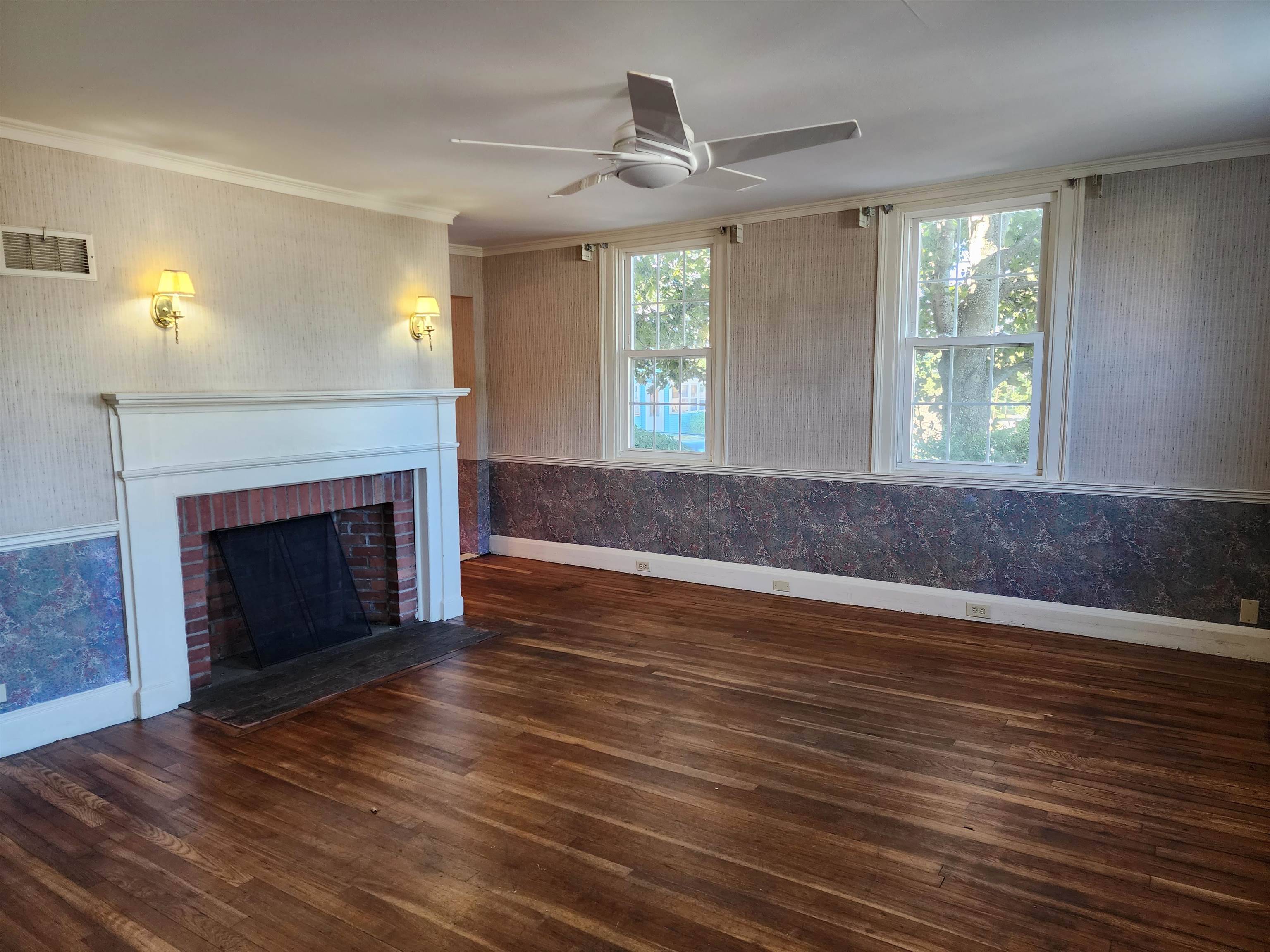 Newly refinished Hardwood Floors in Living Room, Dining Room & Bedroom  (1st Floor @ William Street)