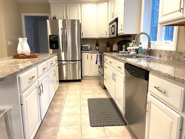 Updated with granite, SS appliances and tile floor