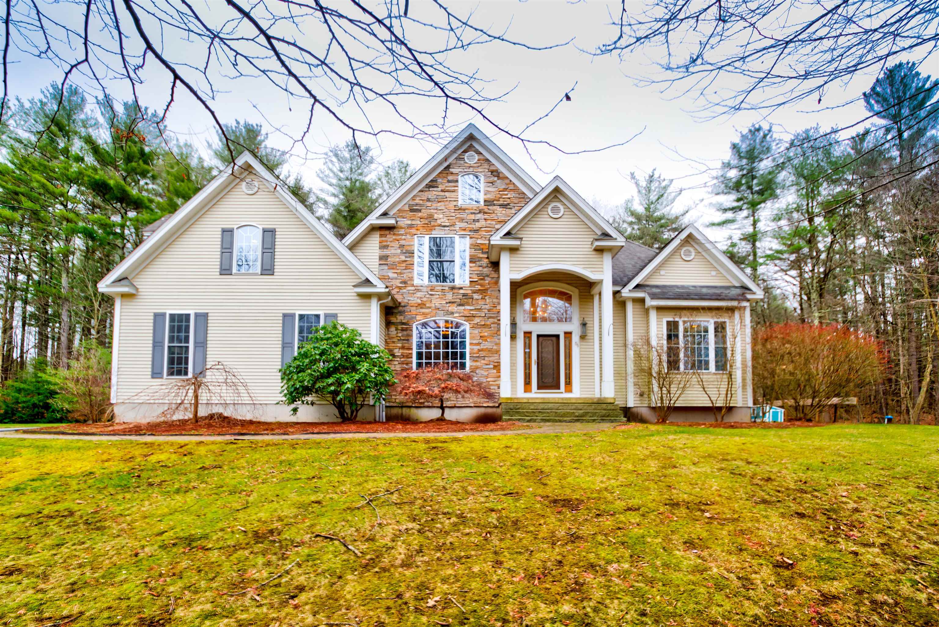 BACK ON MARKET DUE TO BUYERS FINANCING. Don't miss your oppurtunity to call this 2755 sq.ft. contemporary colonial your own! In one of Londonderry's most sought-after neighborhoods "Misty Meadows."  As you pull into the driveway you'll be wowed by the exterior features and striking roof lines!  As you enter this absolutely gorgeous home with an expansive floor plan you'll be greeted by an open foyer and hardwood floors while entering into the stunning family Room with dramatic vaulted ceiling and custom built-ins. The open concept family room flows right into kitchen which has granite countertops and Bosch stainless steel appliances. The large dining room is finished with wainscoting and is right off the kitchen.  Rounding out the first floor is the master suite with hardwood floors with a large on suite.  The 2nd floor consists of 3 additional bedrooms. The 3rd bedroom is an enormous area that could be used as 2nd floor master or a bonus/rec room.  The exterior has irrigation system and very large new Trex deck which means no maintenance!!!!!   WHO WANTS TO CALL THIS THEIR HOME?  Open house Sunday 3-26-2023 11-1.