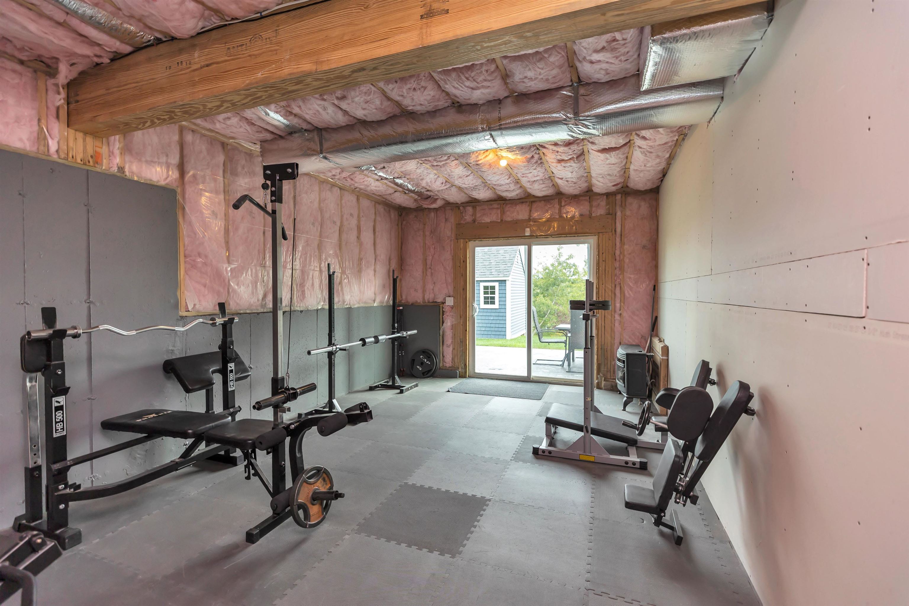 GYM area in Basement with Sliders