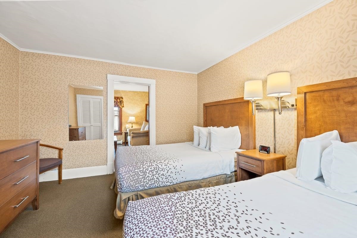 Many rooms have two beds, all beautiful linens and comfortable beds