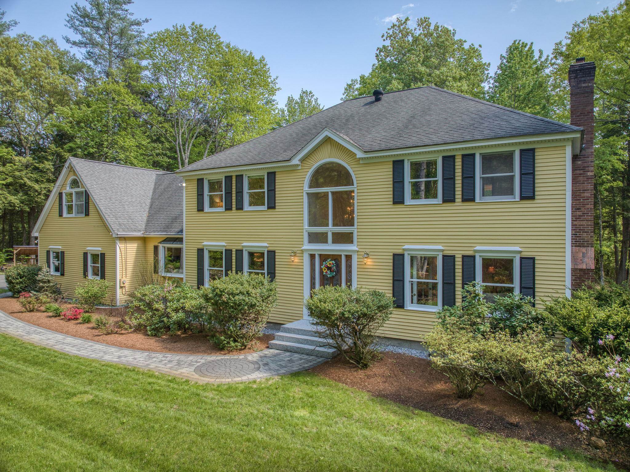 Paver Pathways are Featured in Front and Back