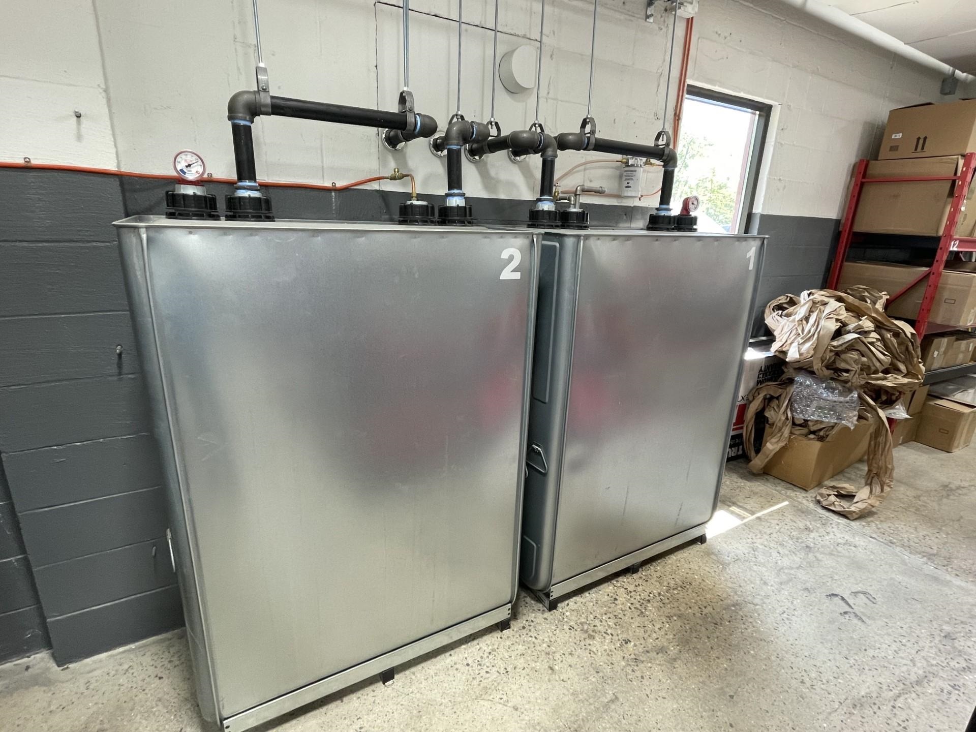 two new 275gal double walled oil tanks. Stainless steel
