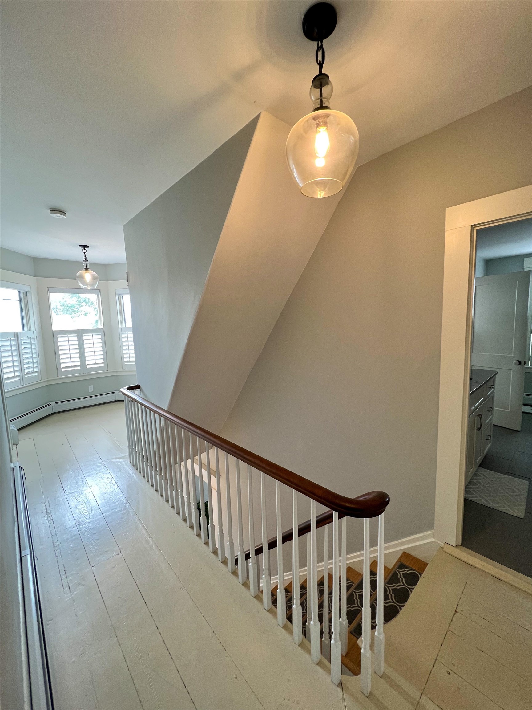 This elegant home also features modern light fixtures and neutral paint colors throughout