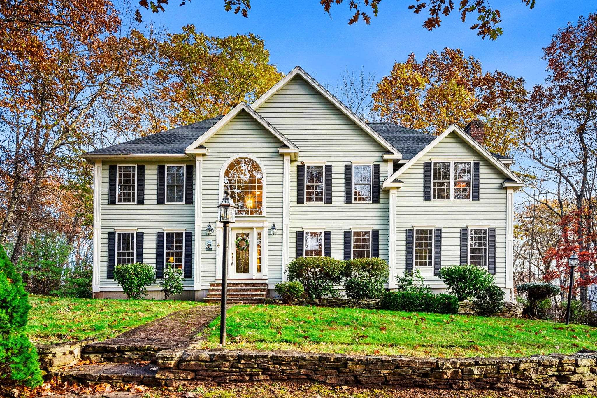 Charm & Elegance is this classic 4-bedroom, 3 baths Colonial located in desirable Nottingham Woods. With a 3 stall attached garage, the home offers loads of room including a cathedral 2 story foyer with hardwood floors, 4 season room with a cathedral ceiling, large 32 x 14 /2 tier deck and, 16 x 14 screen porch. A fireplace Livingroom, which has bright light airy windows and the deck overlooks 2.20 acres of private wooded tranquility. The 8 ft ceiling with 5 ft oversize window in every room offer glimpses of nature throughout the seasons. Convenient location between exit 3 & 4 to route 93, with a new private high school for Windham residents, walking trails, the Windham Town Beach, and grocery stores, shopping, and malls nearby.  Showings begin at the open houses on Saturday, 11/11 from 10-12 pm and Sunday, 11/12 from 12-3 pm.