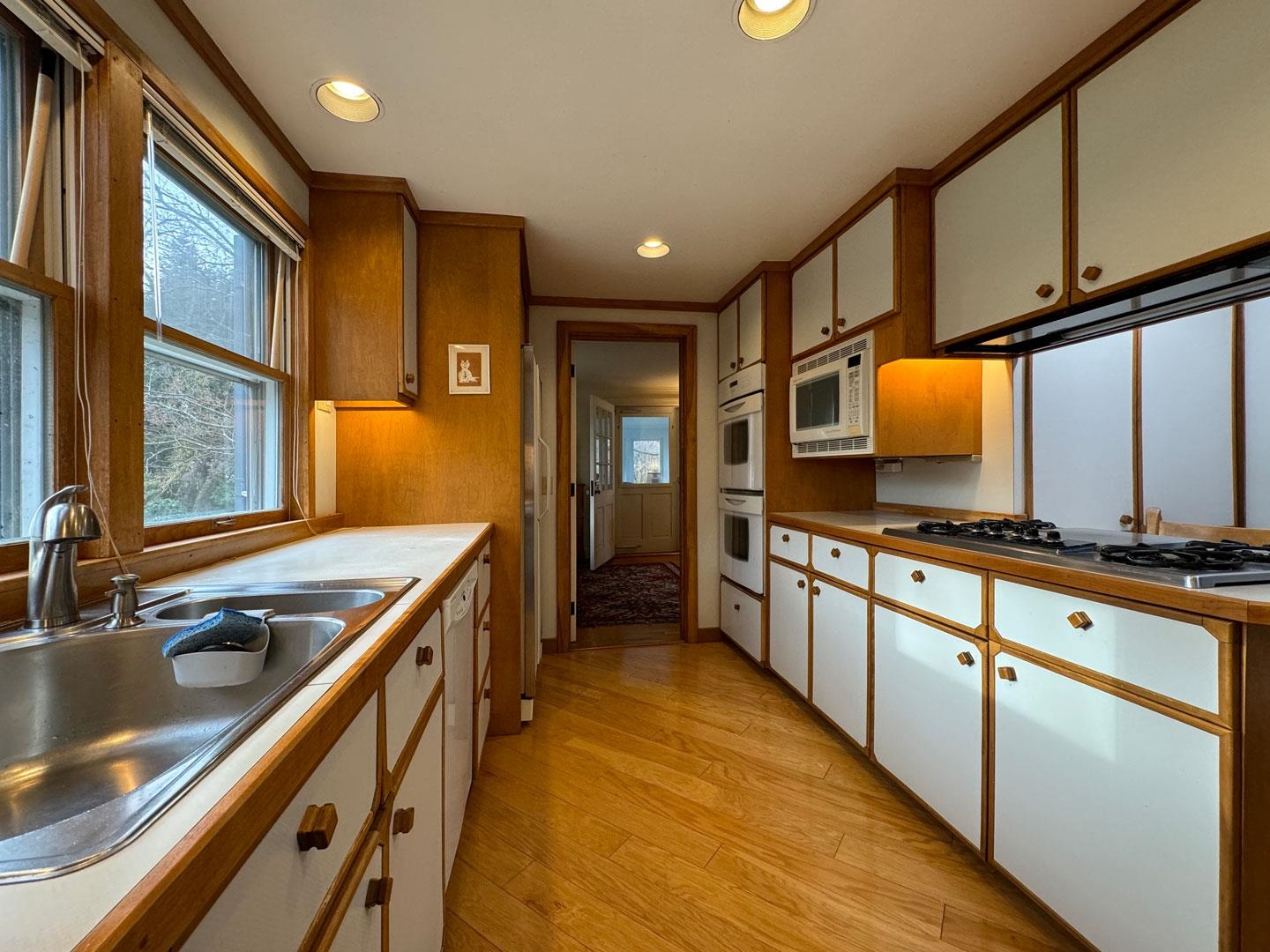 Oversized efficient eat-in galley kitchen off living room and dining room