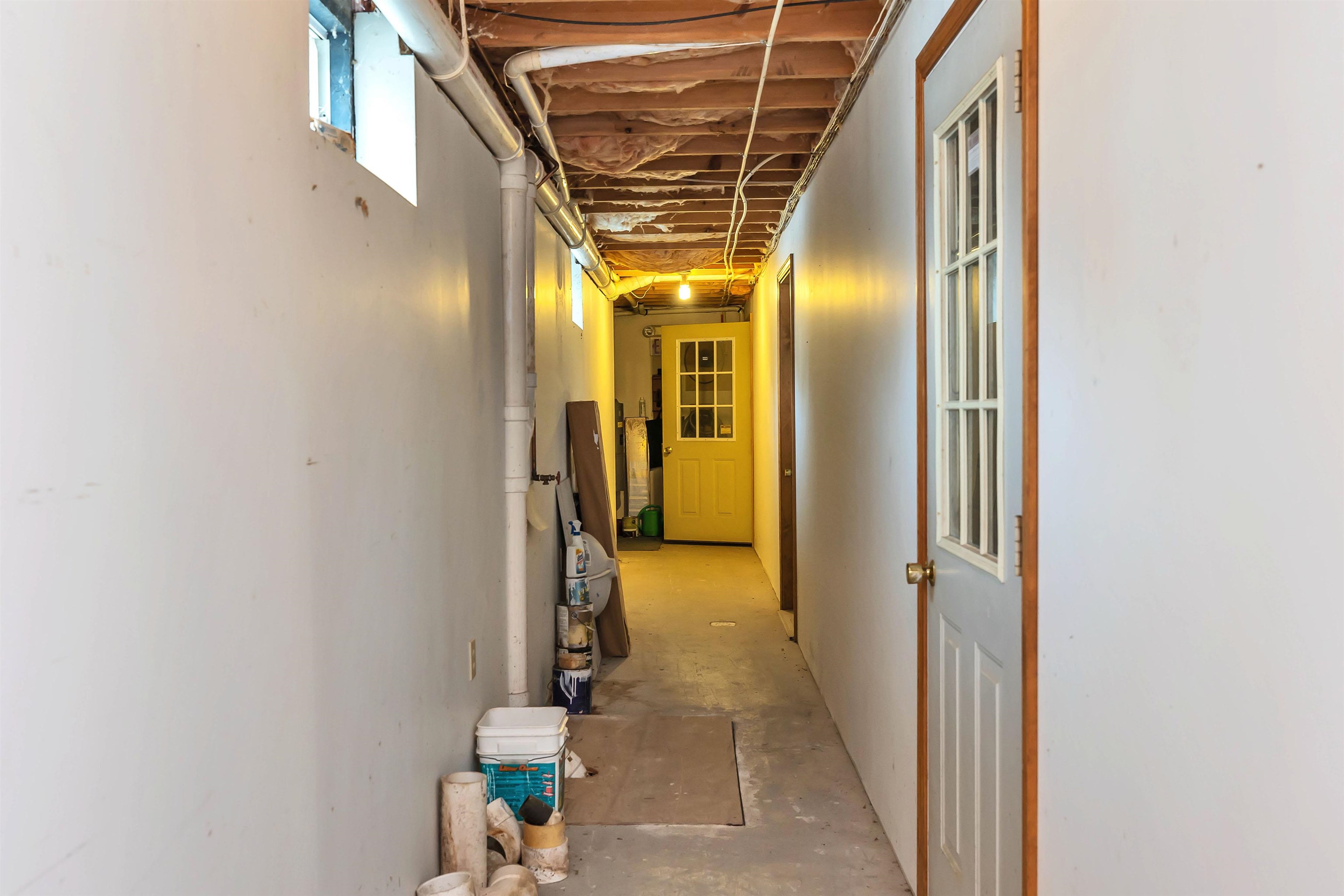 Hallway to locked tenant storage rooms