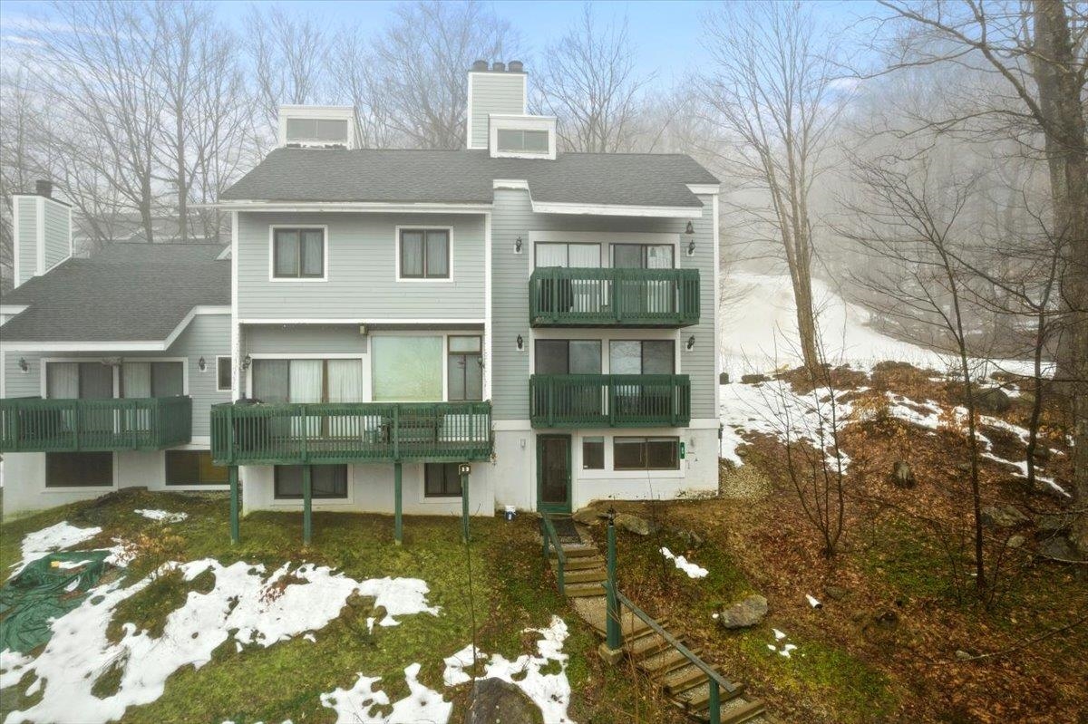 Prime location, ski-on, ski-off with direct access to Sachem trail, with just a few steps from your door and you'll be on the slopes! This is a bright and sunny condo with 3 bedrooms, 2 1/2 bathrooms and a loft. There is a cathedral ceiling in the living/dining area with a wood burning fireplace and a deck with long distance view. Some recent updates include kitchen appliances and countertops. Enjoy this end unit with 3 levels of living space with no one living above or below you. Just minutes away from the Fox Run Golf course, a championship 18 hole course. This Okemo Trailside community has a heated swimming pool and 2 tennis courts for your summertime fun.