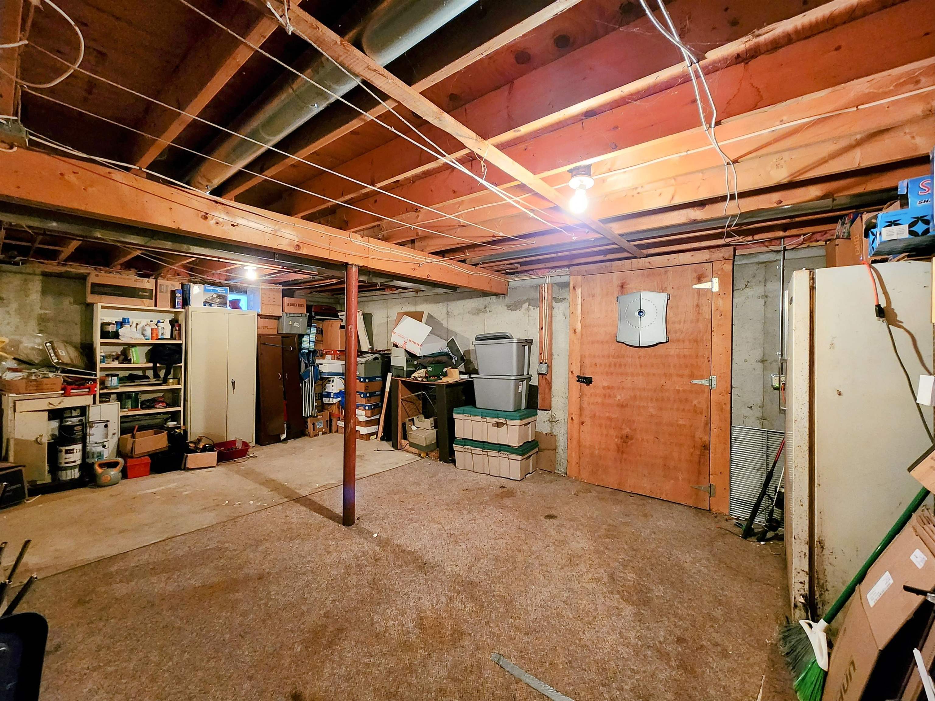 2nd view of the unfinished space in basement