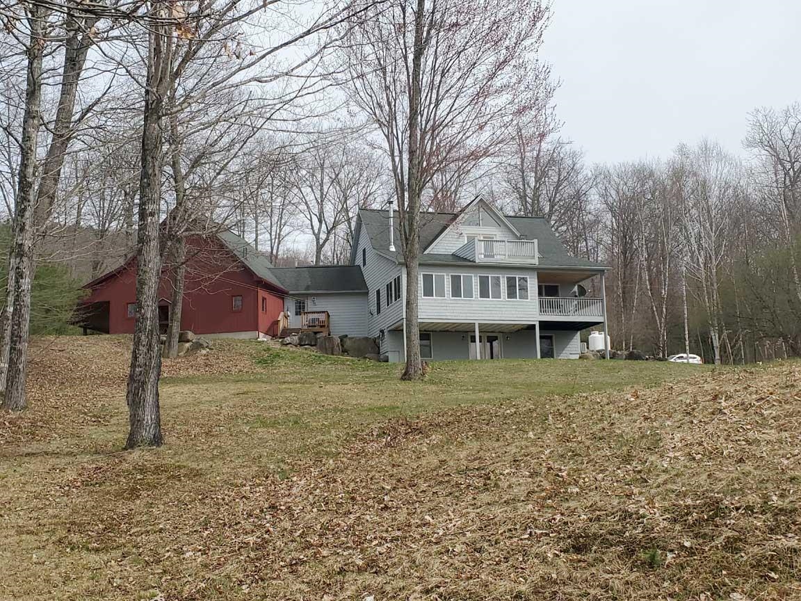 1.75 Story Single Family Home in Hebron NH
