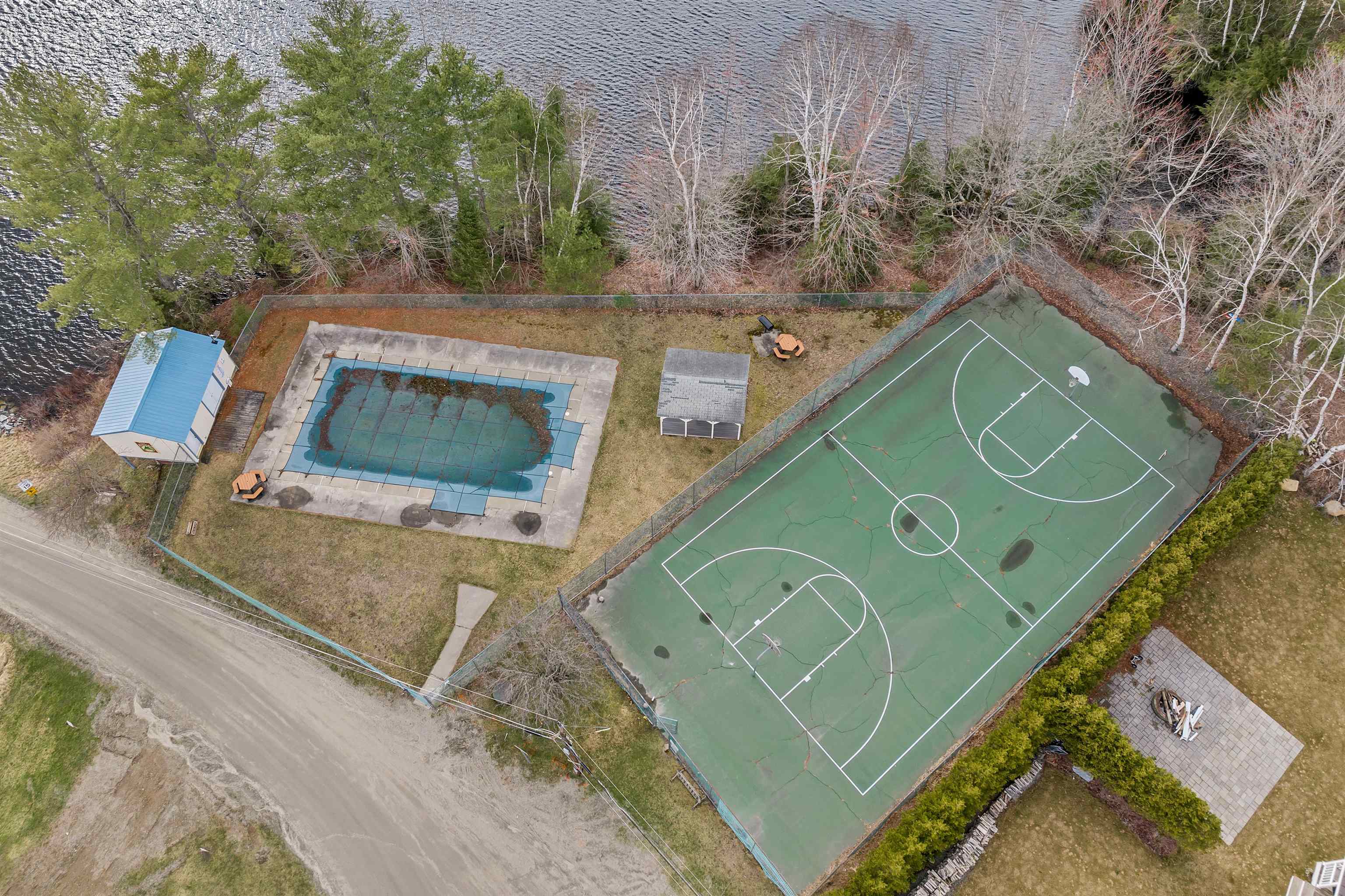 Inground pool and basketball courts