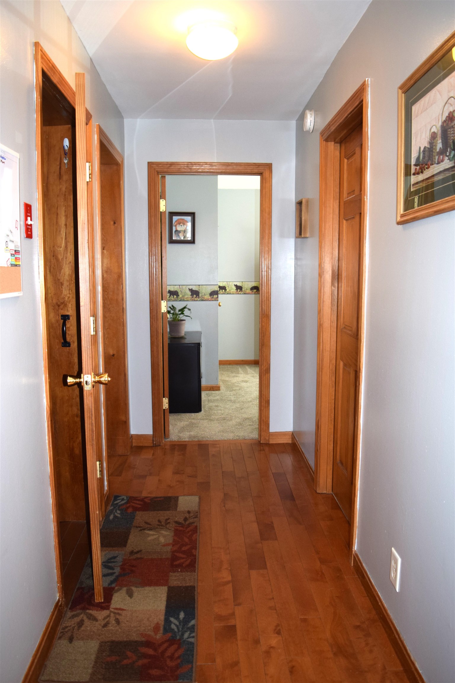 Center hallway on main level with solid wood doors