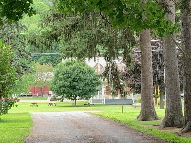 Driveway is opposite the Village Green 21793439