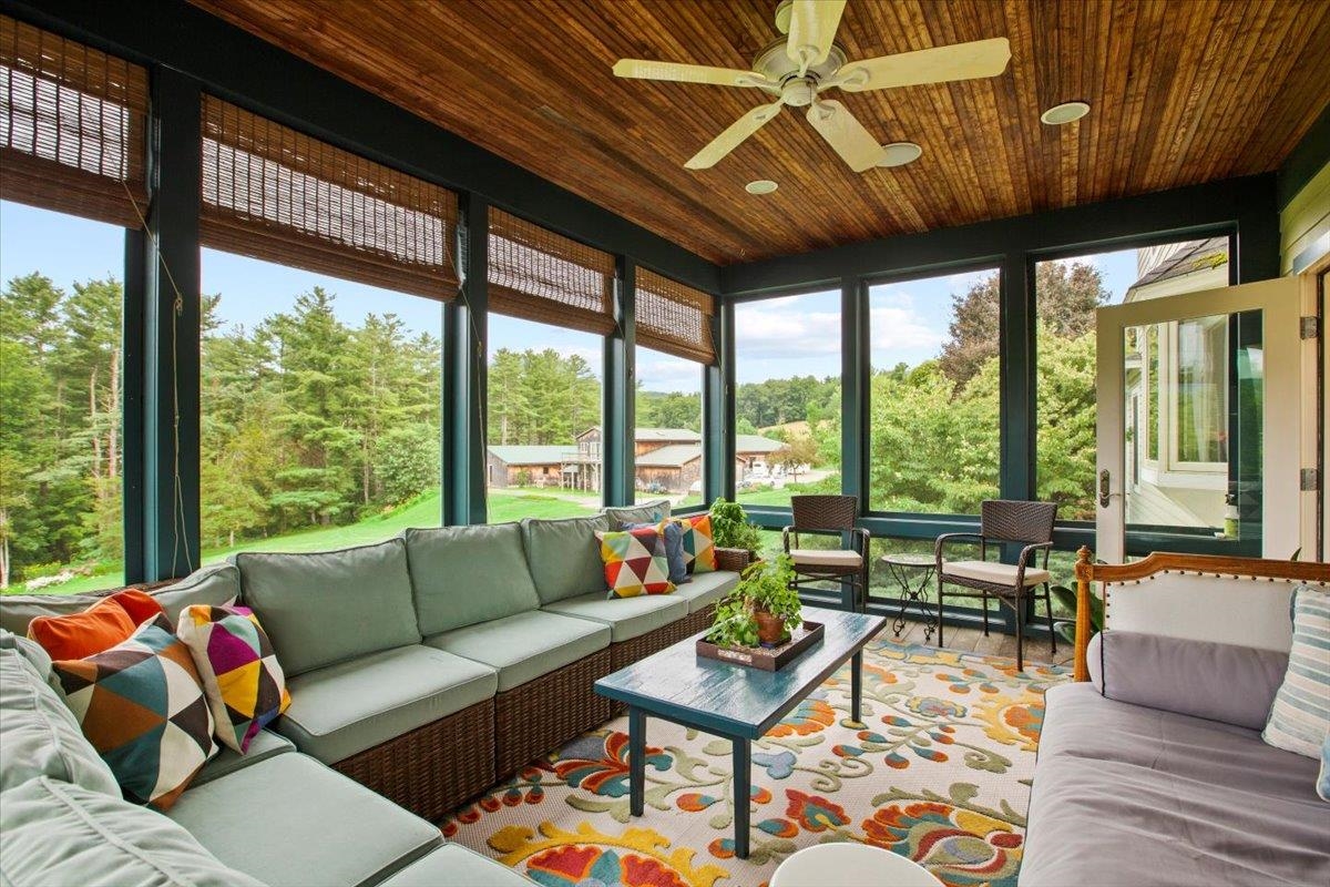 Screened porch off the kitchen and dining area