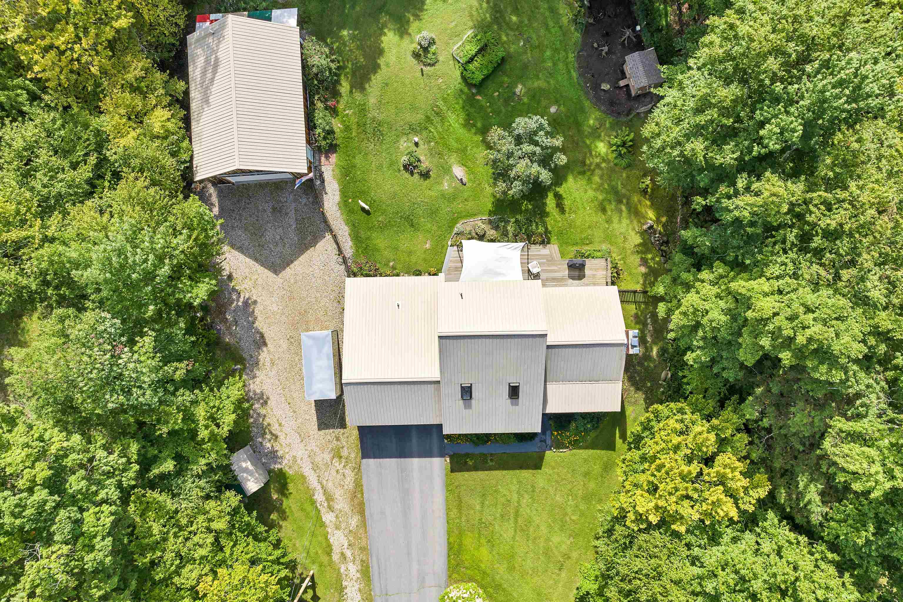 Aerial view of house and barn