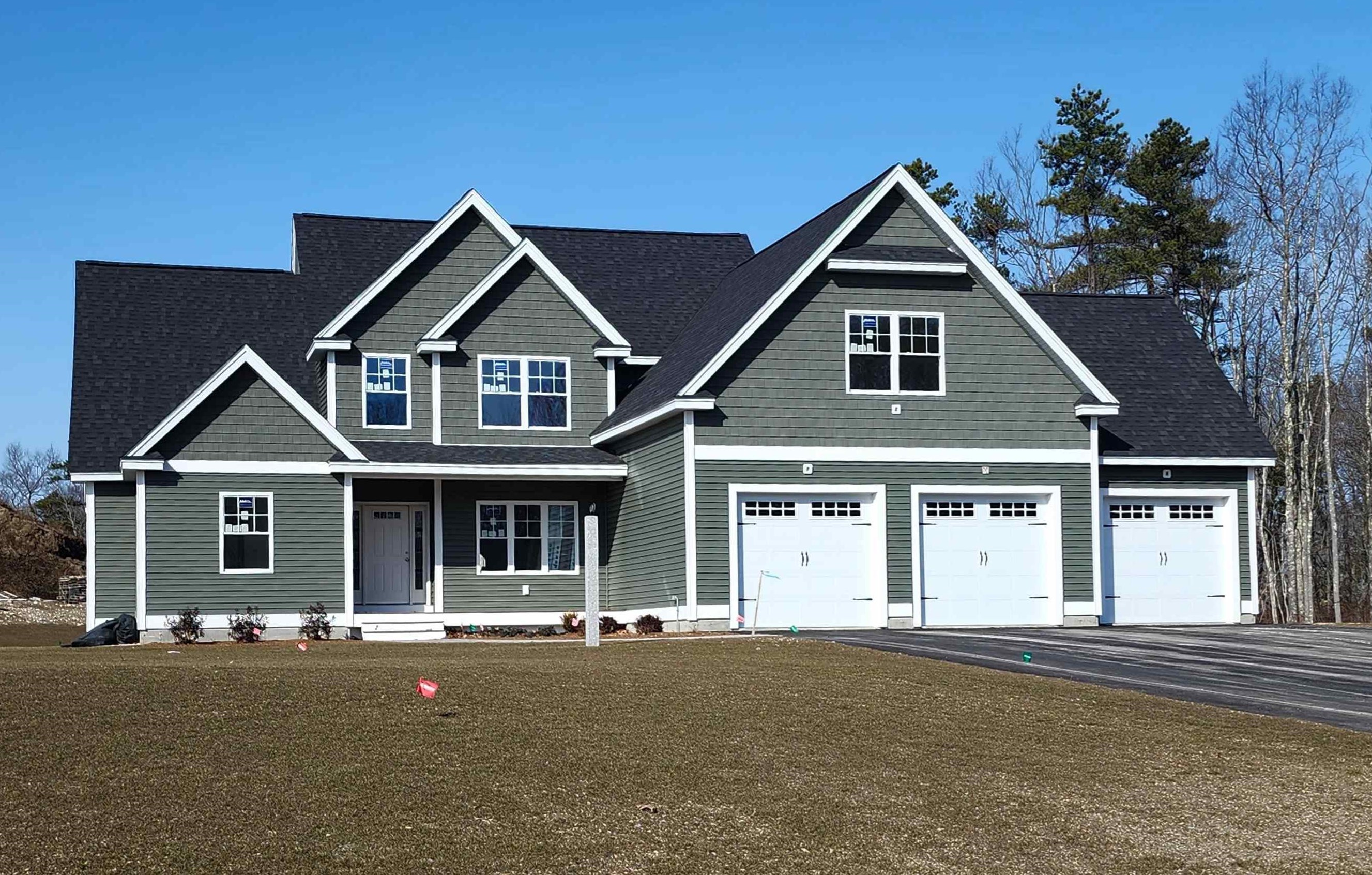 Stunning New Colonial in Desirable Denali Estates!  Welcome to Denali Estates, a breathtaking new construction neighborhood offering expansive single-family parcels with no HOA and no covenants! This stylish Tecumseh Colonial is nearly complete, featuring 2,739 sq. ft. of refined living space.  Step into the impressive great room, where soaring vaulted ceilings, a cozy gas fireplace, and gleaming hardwood floors create the perfect gathering space. The spacious kitchen boasts a walk-in pantry, breakfast bar, and seamless flow into the dining room—ideal for entertaining.  Retreat to the first-floor primary suite, complete with a large walk-in closet and a spa-like bath featuring double vanities, a soaking tub, and a tiled shower. Upstairs, three additional bedrooms provide ample space, including a private en-suite for added convenience.  Additional highlights include a mudroom, separate laundry room, powder room, covered front porch, rear deck, and a 3-car garage. All this in a prime location, just minutes from I-93, shopping, dining, parks, the rail trail, and Lake Massabesic.  Join us every Saturday from 12-2 for our Open House! Don’t miss your chance to call this exquisite home yours!