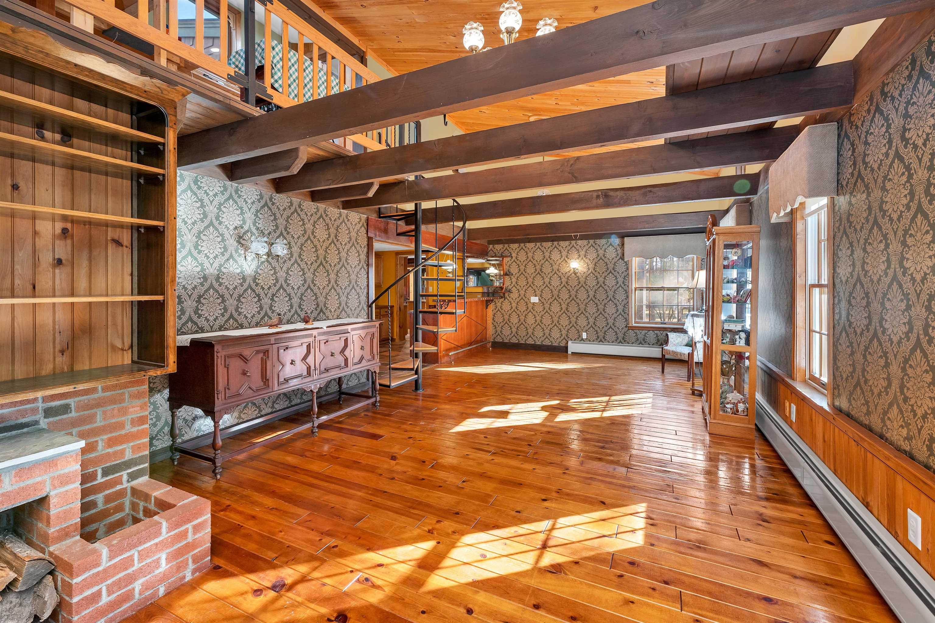 LOOKING BACK FROM THE WOOD STOVE IN THE LIVING/DINING ROOM AREA