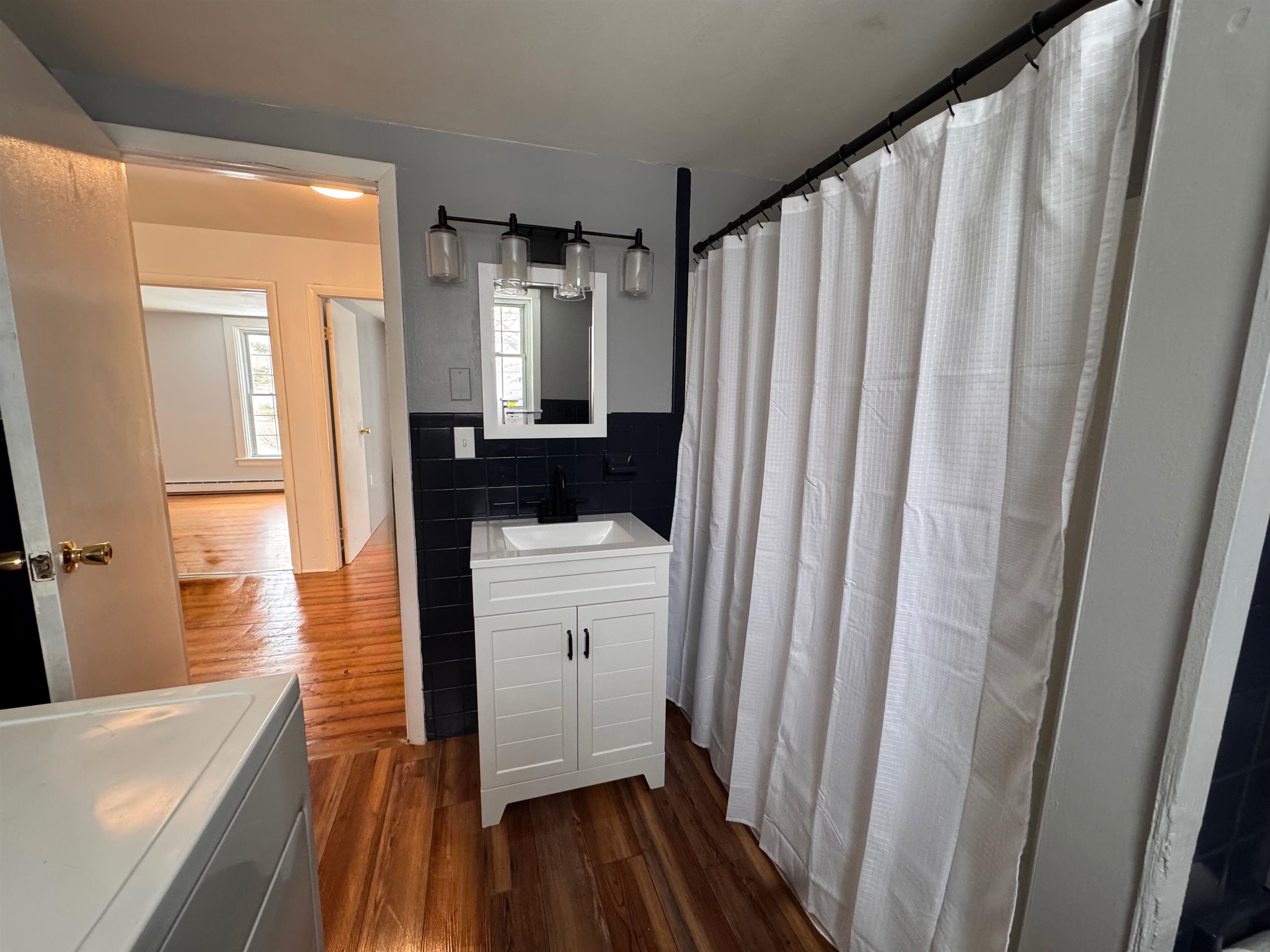 Apartment 1 - Full Bath and Laundry!