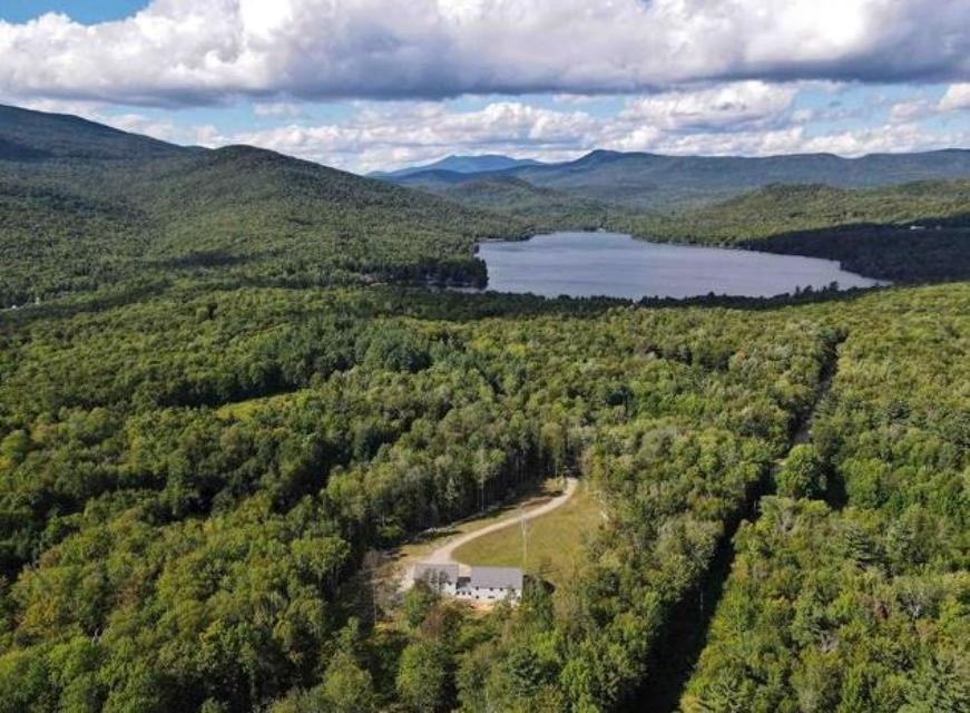 This beautiful estate is perched above stinson lake and right next to stinson mountain