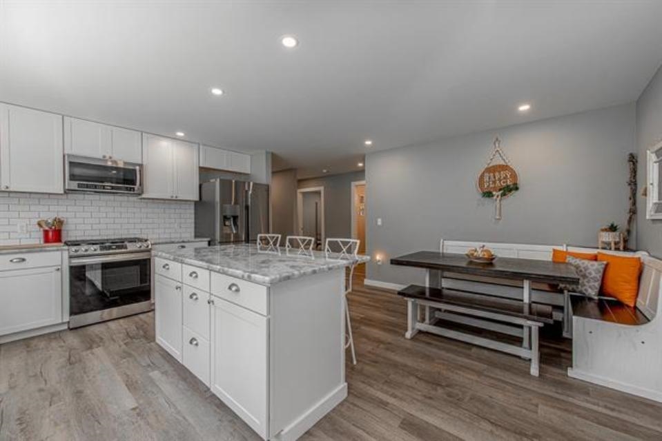 Extra space off the kitchen to have a eat in dining space