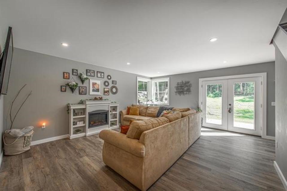 This bright living room opens up to the backyard