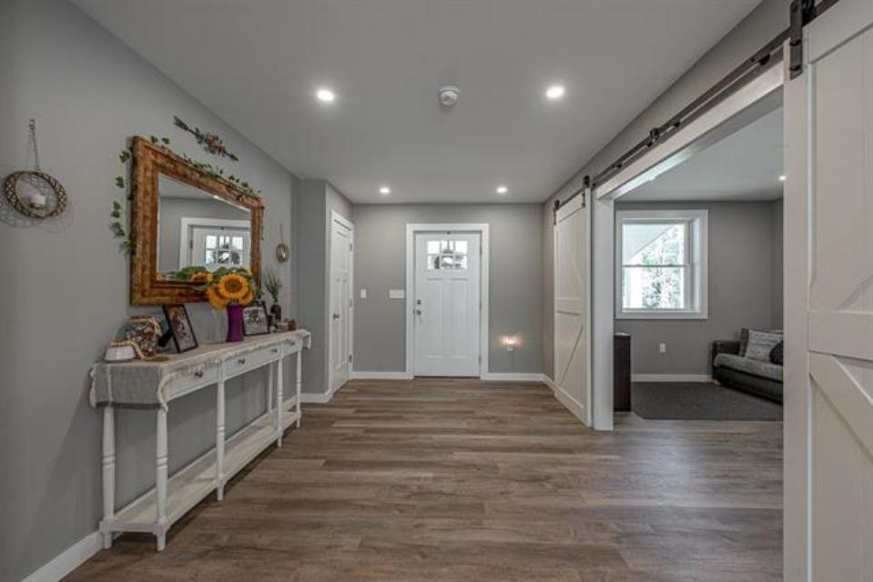 This front door off the farmers porch even has a play room off the entry