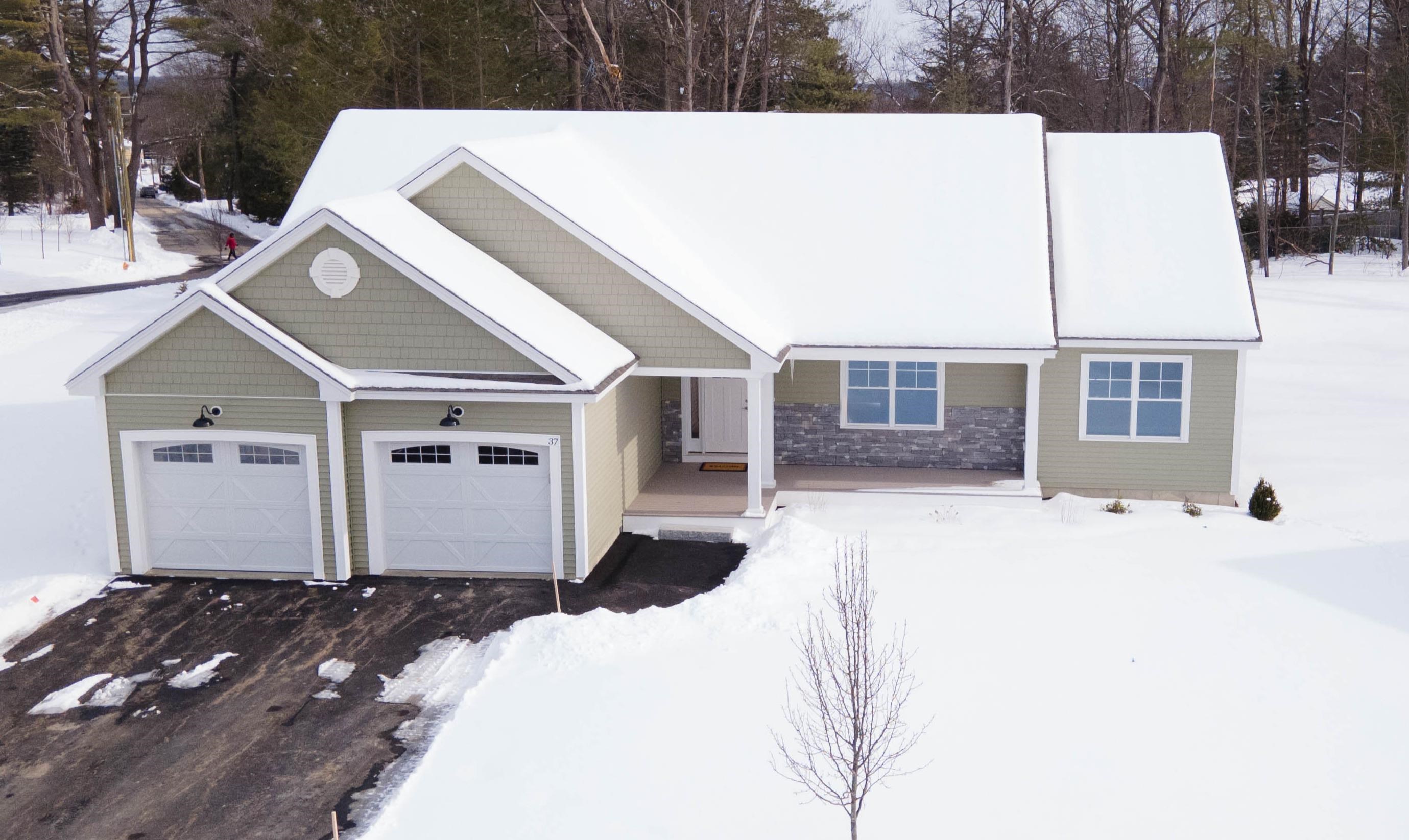 Fabulous new construction in the heart of Nashua's iconic North End.  This open concept 1848 sq. ft. ranch has everything that you need on one level. The split bedroom layout separates the guest bedrooms from the Primary bedroom suite with wide open space in between for entertaining the kitchen, family room and dining area. Low maintenance living will give you more time to do the things that you like to do.  With Greeley Park as a neighbor you can enjoy the walking trails, picnic areas, summer concerts in the bandshell, tennis, pickleball, softball and even horseshoes!  Downtown is also within walking distance and has everything from chef owned restaurants, sports bars, boutique shopping, a public library and performances at Nashua Center for the Arts. Quick Close Possible!