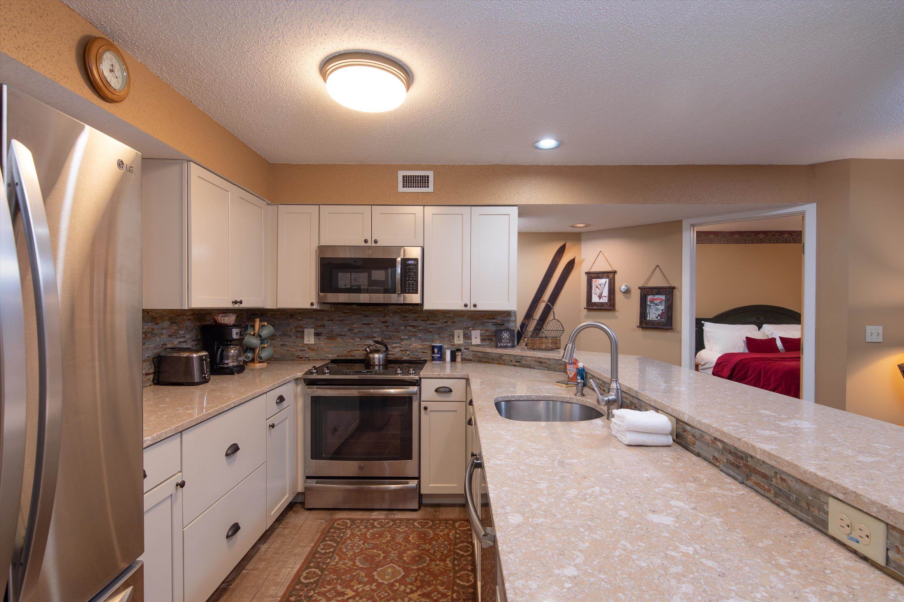 Updated Kitchen with Stainless Appliances 23149654