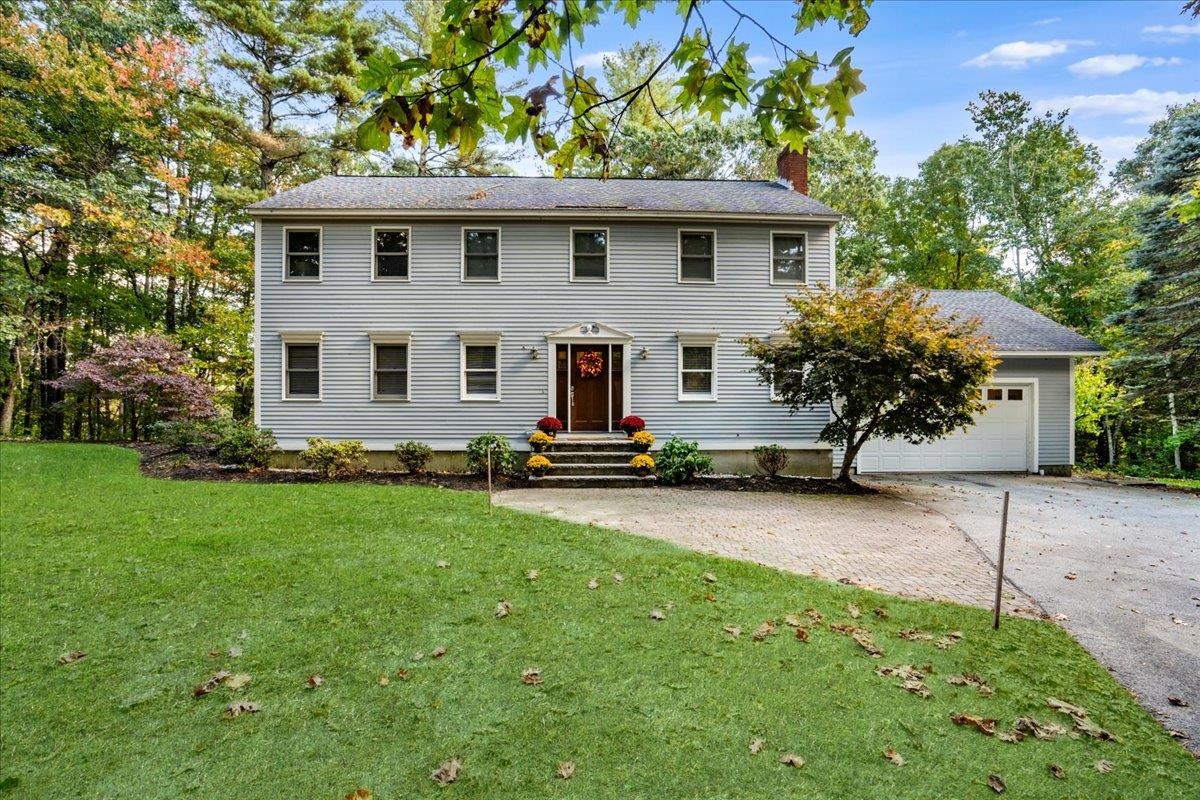 Welcome to 14 Fordway Extension of the highly desired town of Windham, NH! This 4 Bedroom 2.5 Bath Colonial with 2 car garage is set back from the road on just under 4 acres. Beautifully updated home it conveniently located on the Derry/Windham line. Enter your welcoming foyer into the gorgeous UPDATED Kitchen featuring QUARTZ countertops, stainless steel appliances, breakfast nook and Formal Dining Room with built-ins over looking back Deck. Spacious Living Room and cozy Family Room with Fireplace and built ins. First floor Pantry/Laundry Room. Second floor offers large front to back Primary Bedroom en suite with walk in closet, 3 generous size bedrooms all with hardwood and double vanity Full bathroom. Finished walkout basement with Office is perfect Den/workout room! Are you ready to view your next home?