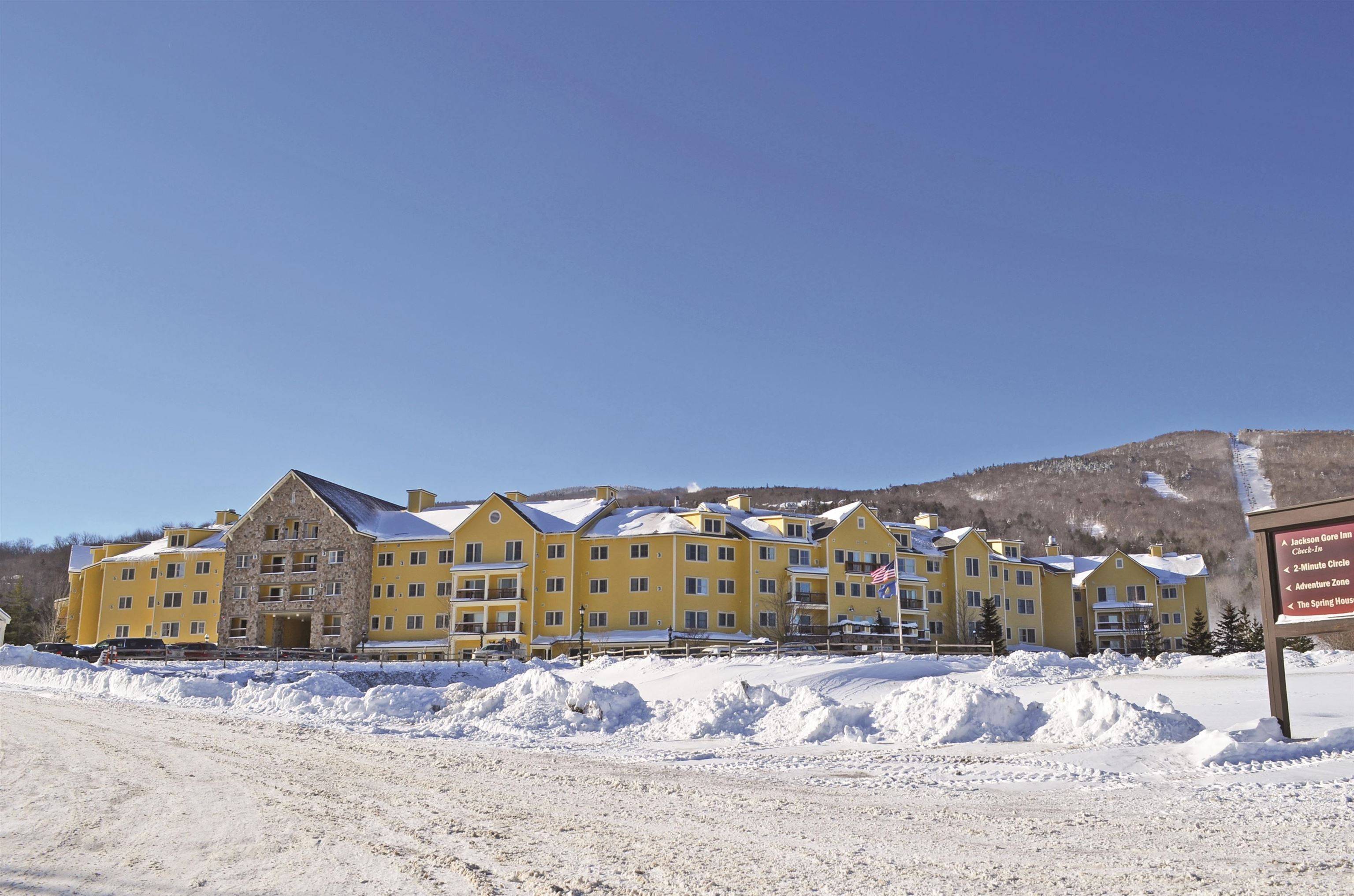 Jackson Gore Inn 211/213 QIV on Okemo Mountain. Come experience the ultimate mountain getaway with this slopeview 1-bedroom 2-bath lockout condo.  Designed for flexibility, the lockout lets you stay on one side while renting the other, maximizing your investment while enjoying all the resort amenities. This spacious condo comfortably sleeps eight. The primary bedroom features two queen beds and a full bathroom, while the main living area includes a Murphy bed, a sleeper sofa, a cozy gas fireplace, a full kitchen, and an additional full bathroom. Located in the heart of Jackson Gore, this condo offers stunning mountain and courtyard views where all the action happens. Step outside the door and ski directly onto the slopes with convenient lift access. After a day on the mountain, enjoy the year-round outdoor pool and hot tubs, or unwind at the arcade, restaurant, and bar—all located within the hotel. A heated garage parking space and private ski locker add to the convenience of this incredible property. Whether you're hitting the slopes in the winter or exploring Okemo’s summer activities, this condo offers the perfect blend of luxury, convenience, and rental potential. Visit the Okemo real estate community today. ROFR