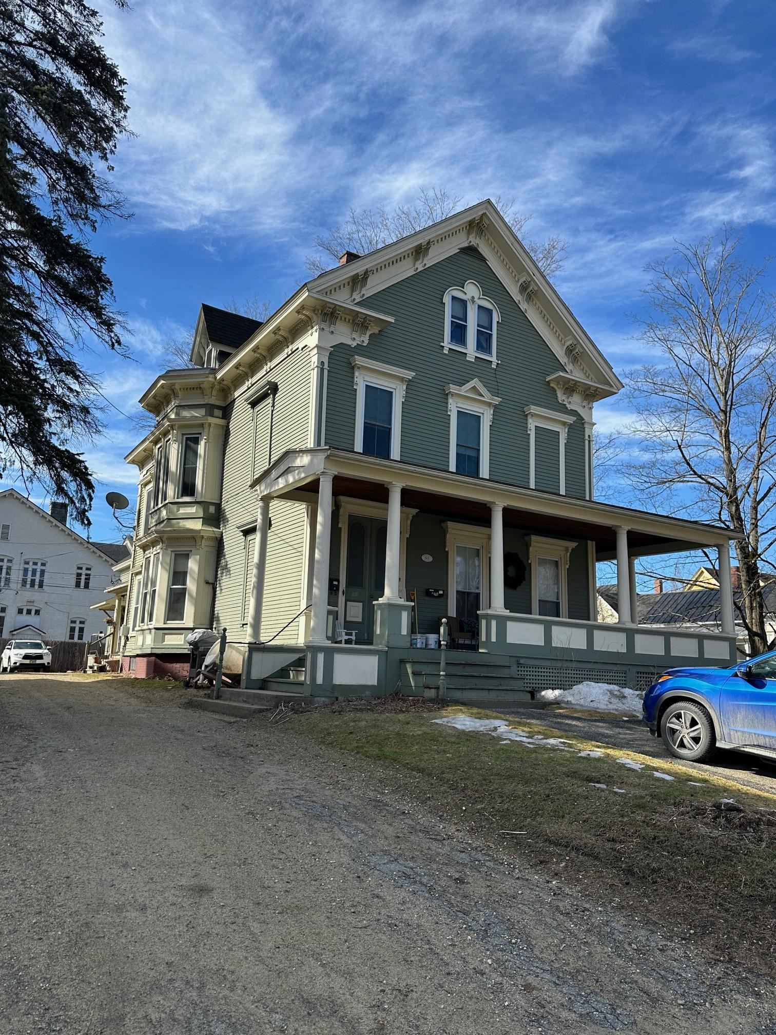 Front of house and east side
